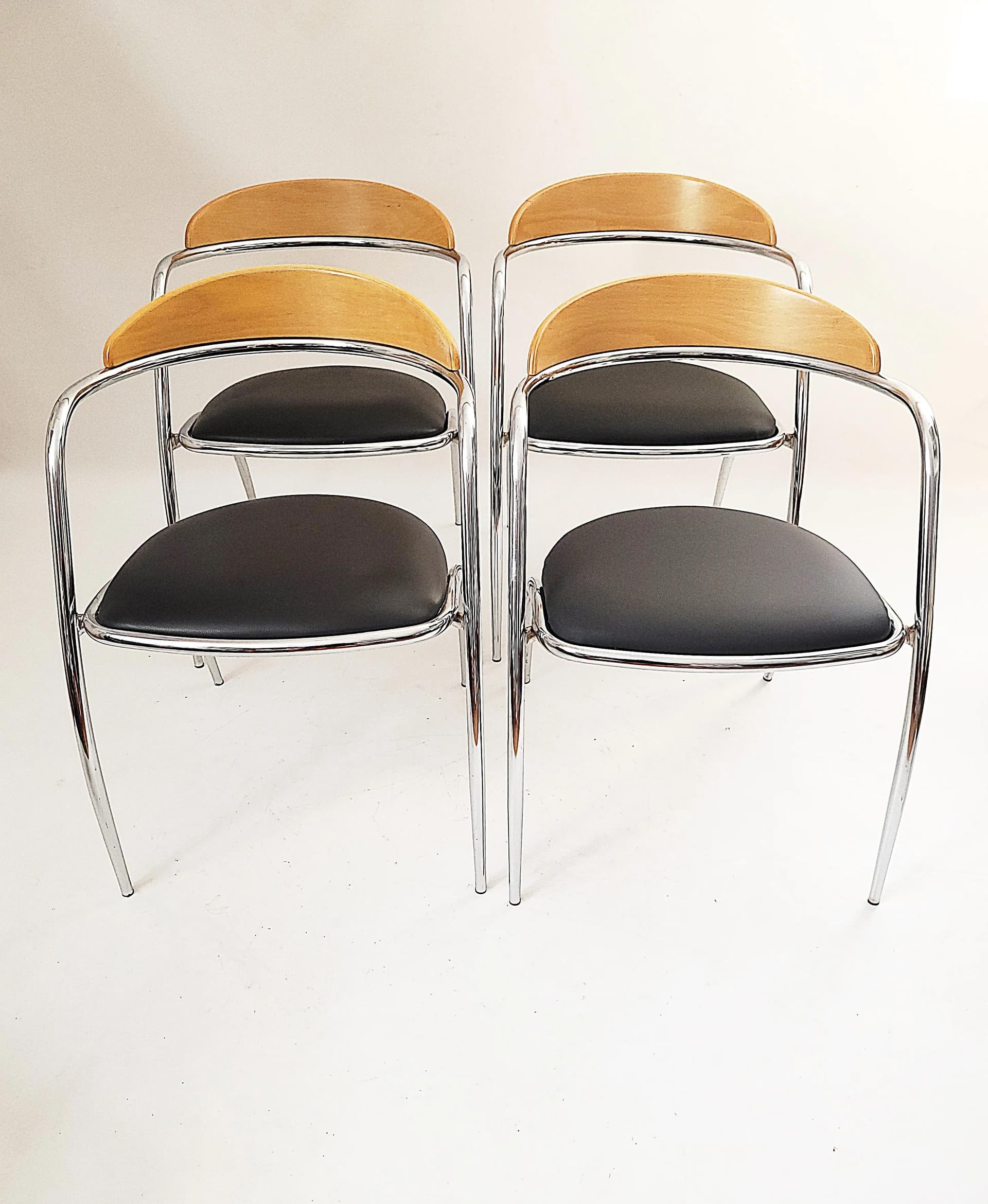 Set of chairs Efezeta, black eco-leather, light plywood, chrome steel, Italy, 1980s. - 85680