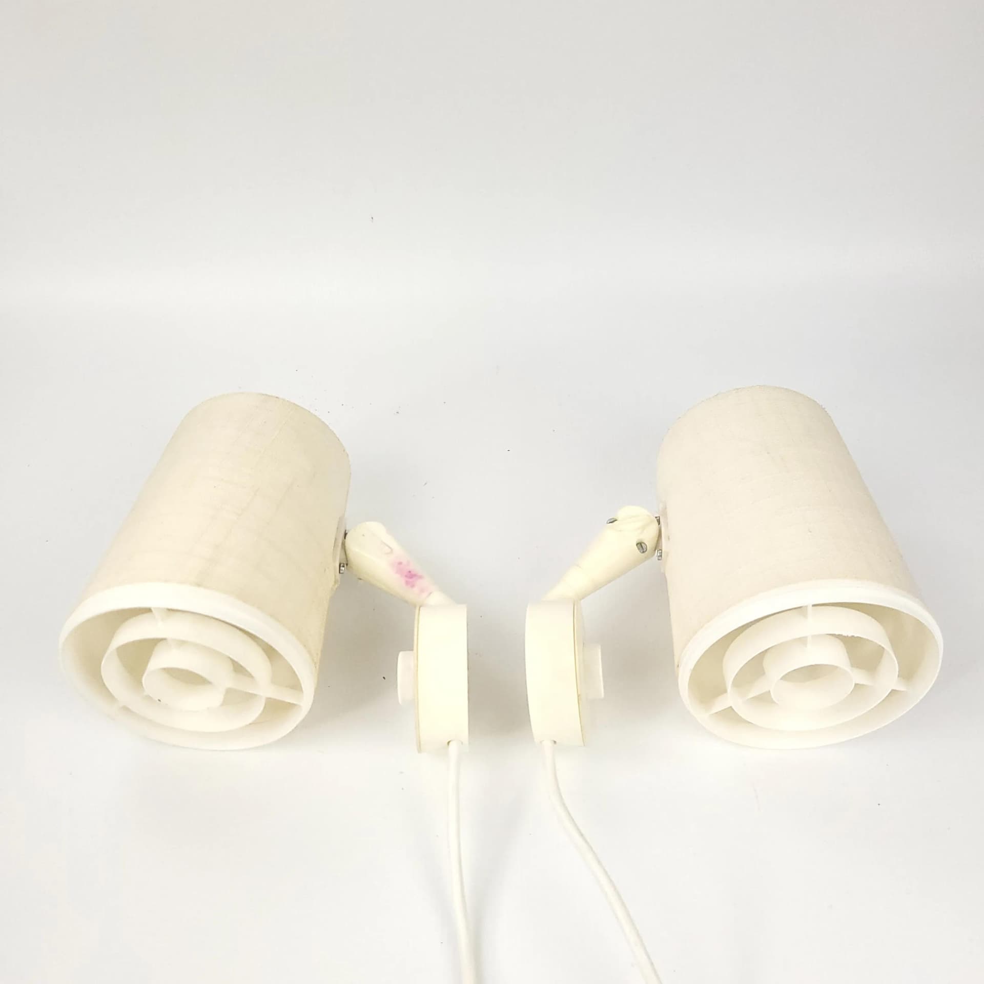 Pair of wall sconces Elidus, ivory white, fabric, metal, plastic, Sweden, 1970s. - 85403