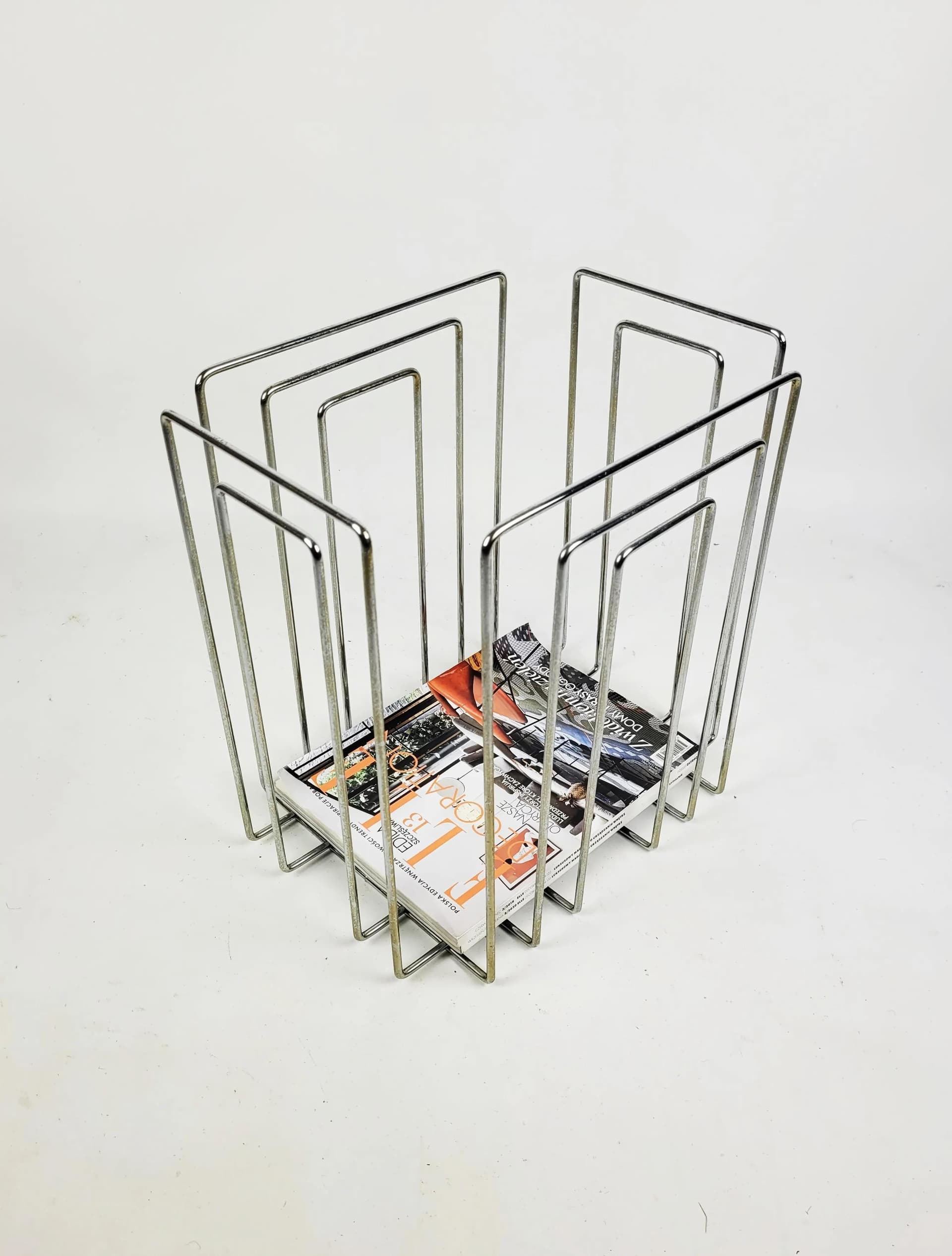 Magazine Rack TMP, silver chrome steel, by W. Glaeser, Switzerland, 1980s. - 85046