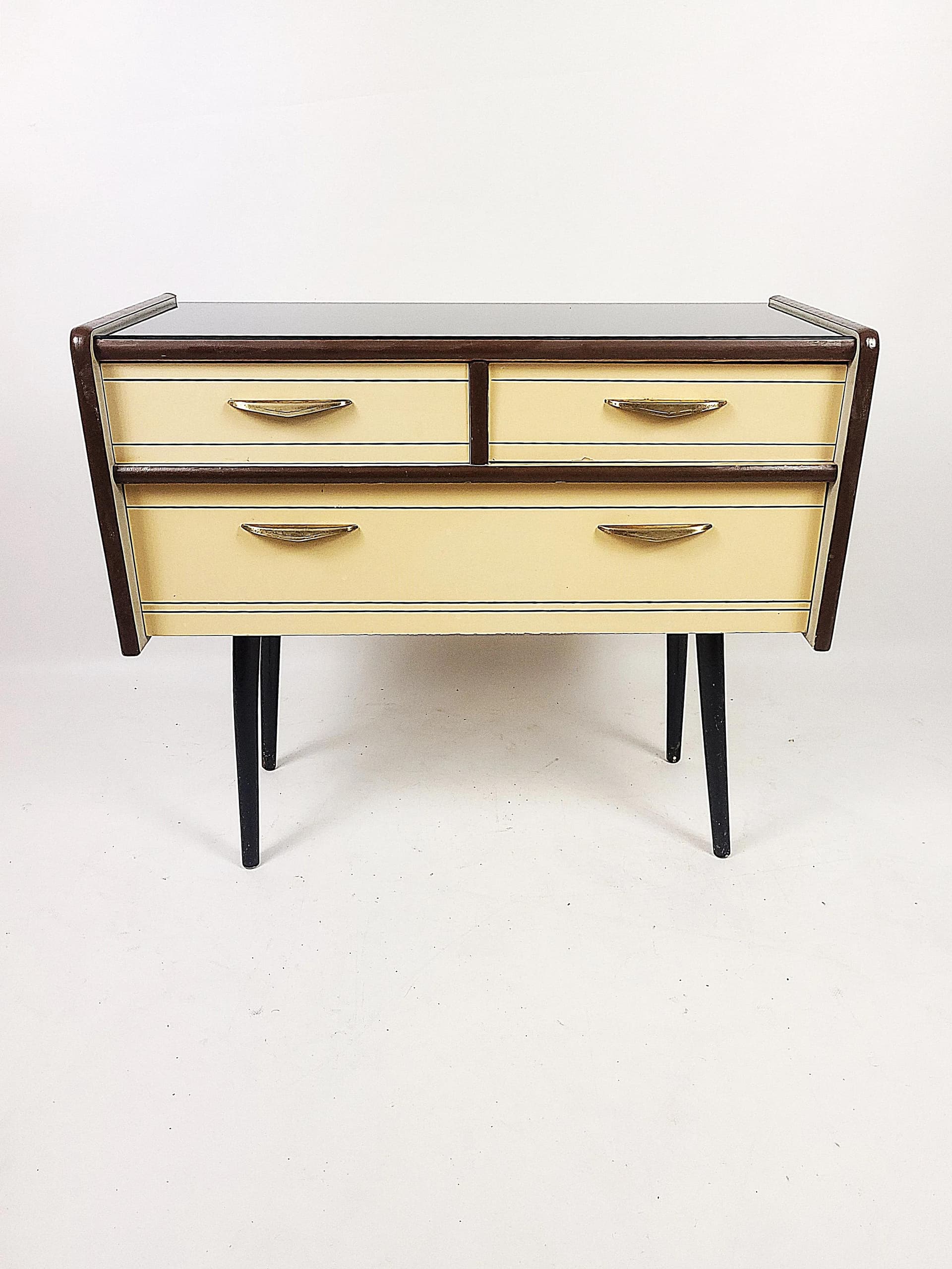 Chest of Drawers Rockabilly, beige wood, black lakobel glass, Poland, 1950s. - 84078