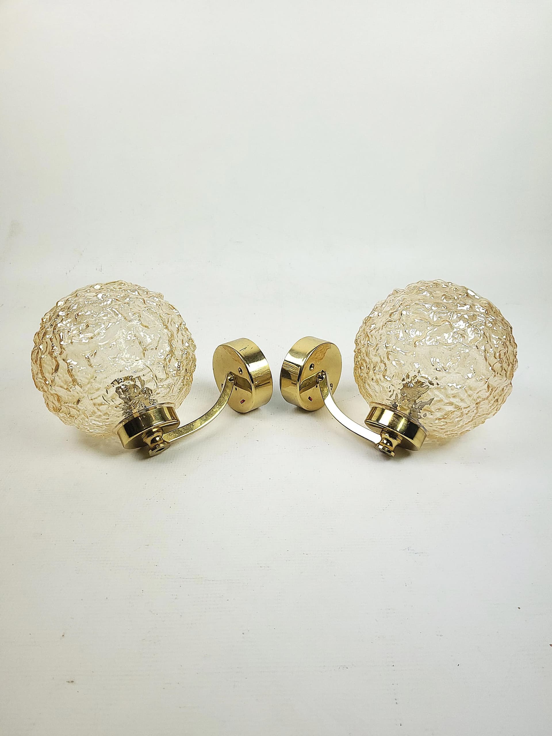 Pair of wall sconces, golden glass, 1970s. - 83759