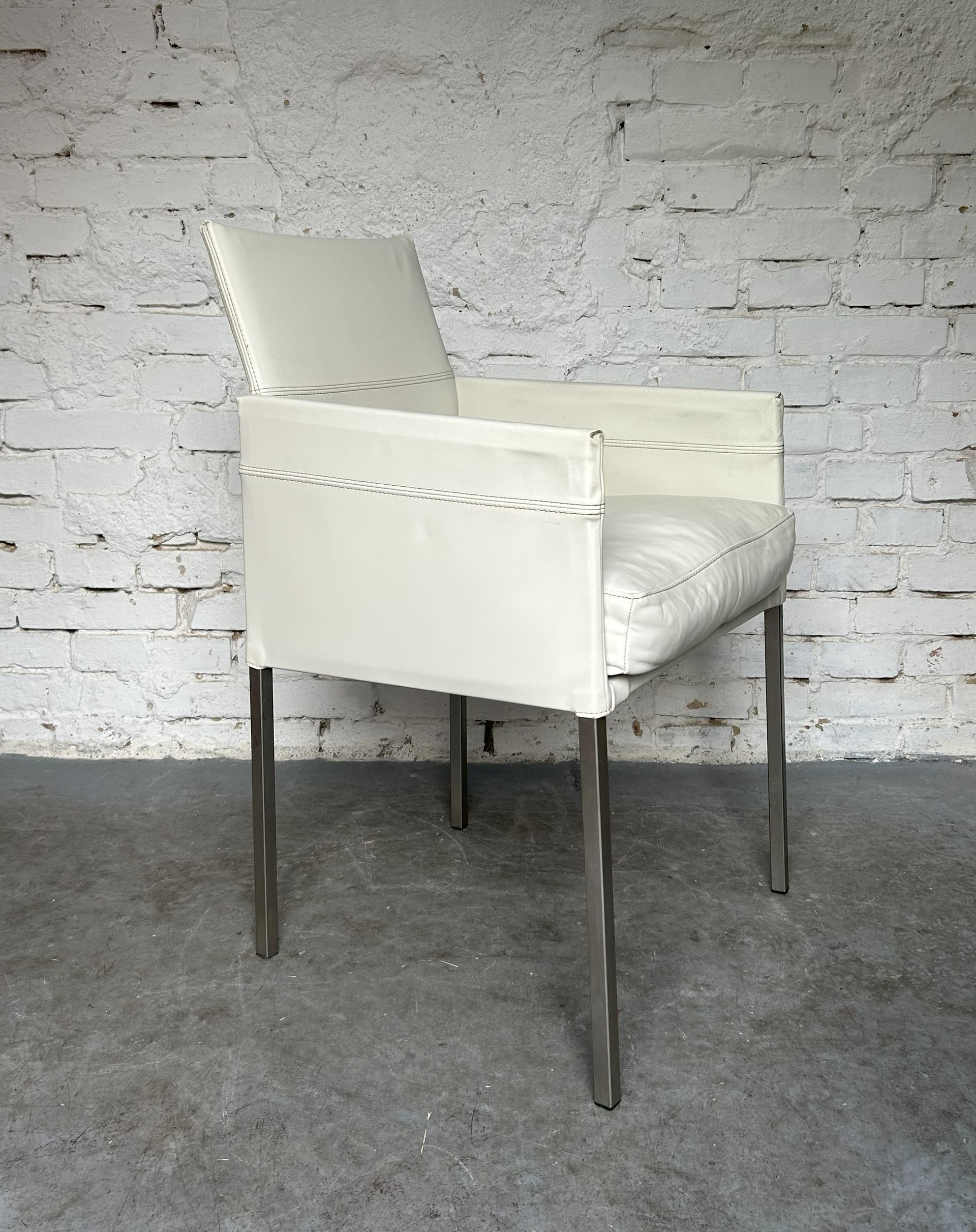 Pair of armchairs, ivory white leather, black metal, Germany, 1990s. - 83670