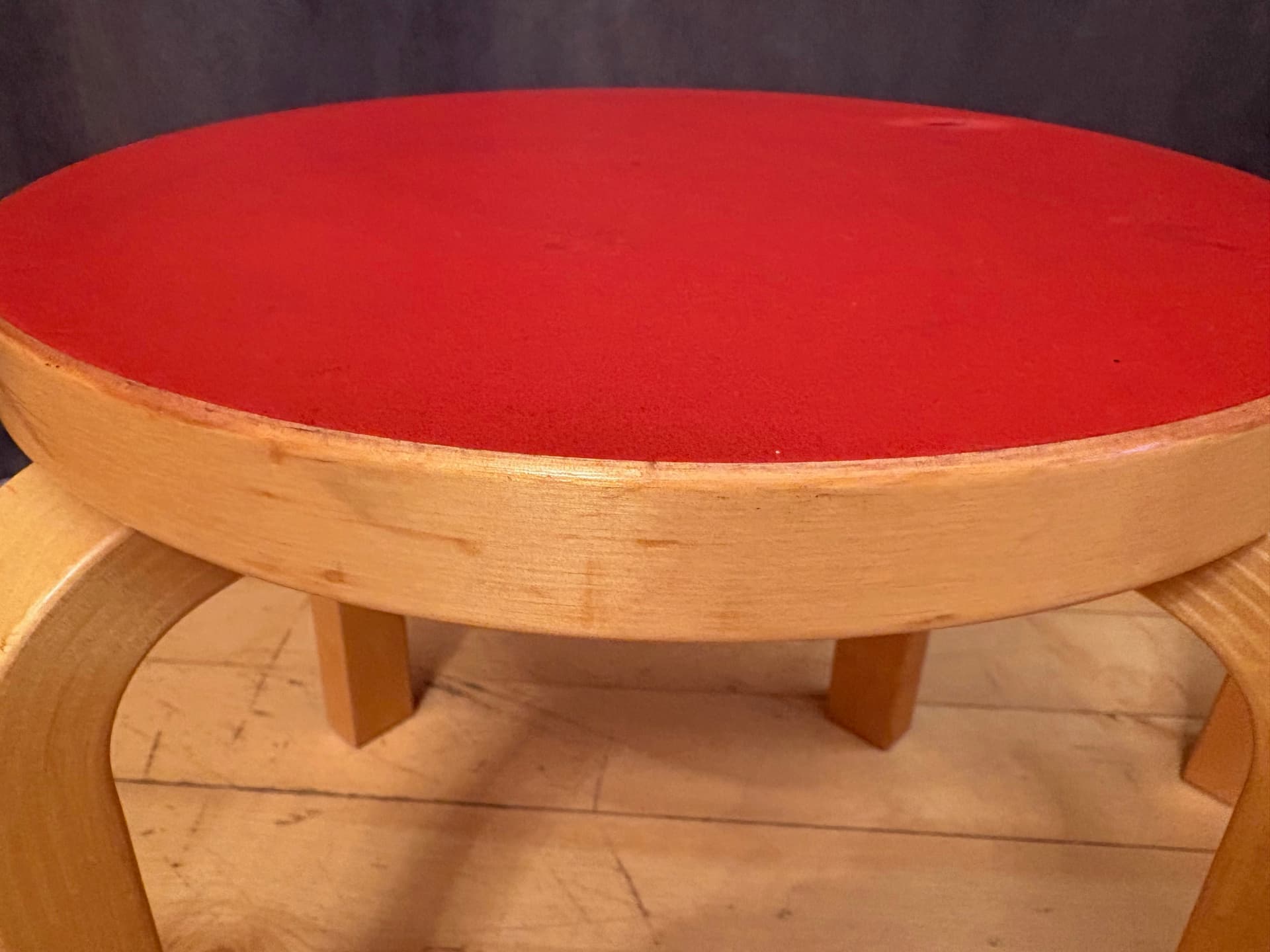 Pair of stools NE60, natural birch, red linoleum, by A. Aalto, Artek, Finland, 1980s. - 83686