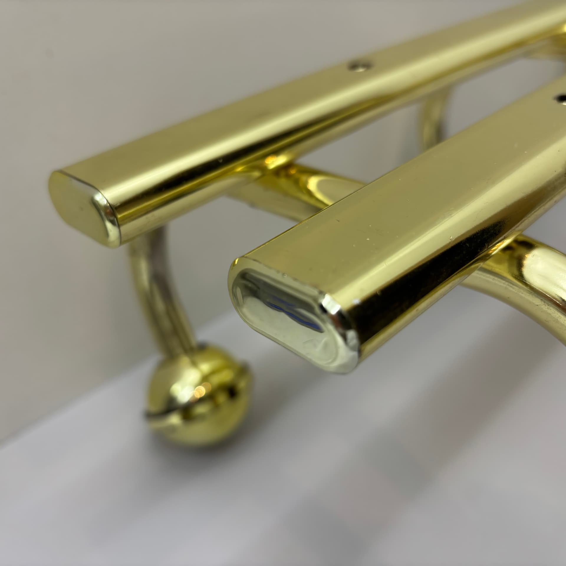 Wall-mounted rack, golden steel, Germany, 1970s. - 91482