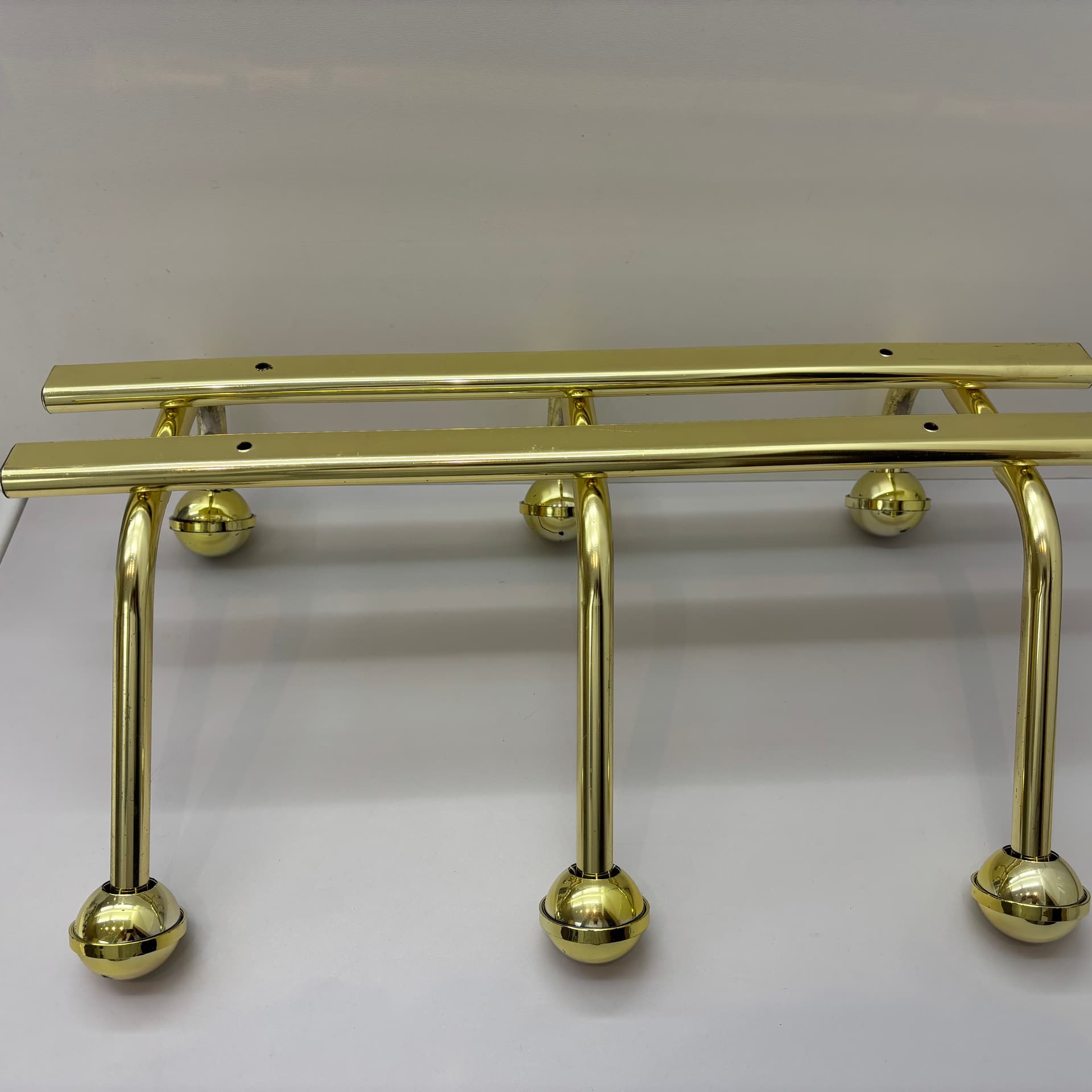 Wall-mounted rack, golden steel, Germany, 1970s. - 91488