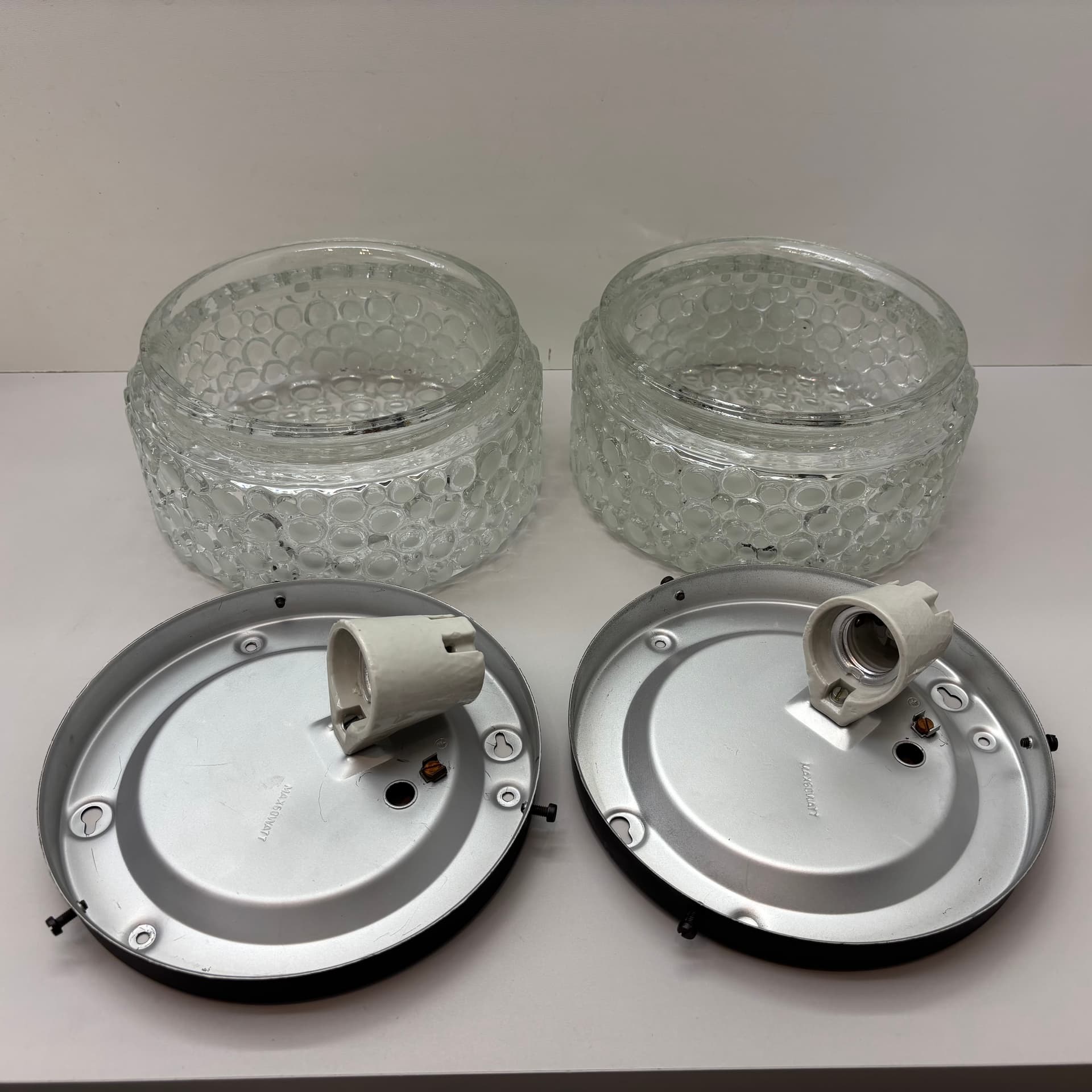 Pair of Bubble wall lamps, transparent glass, black metal, Germany, 1980s. - 92360