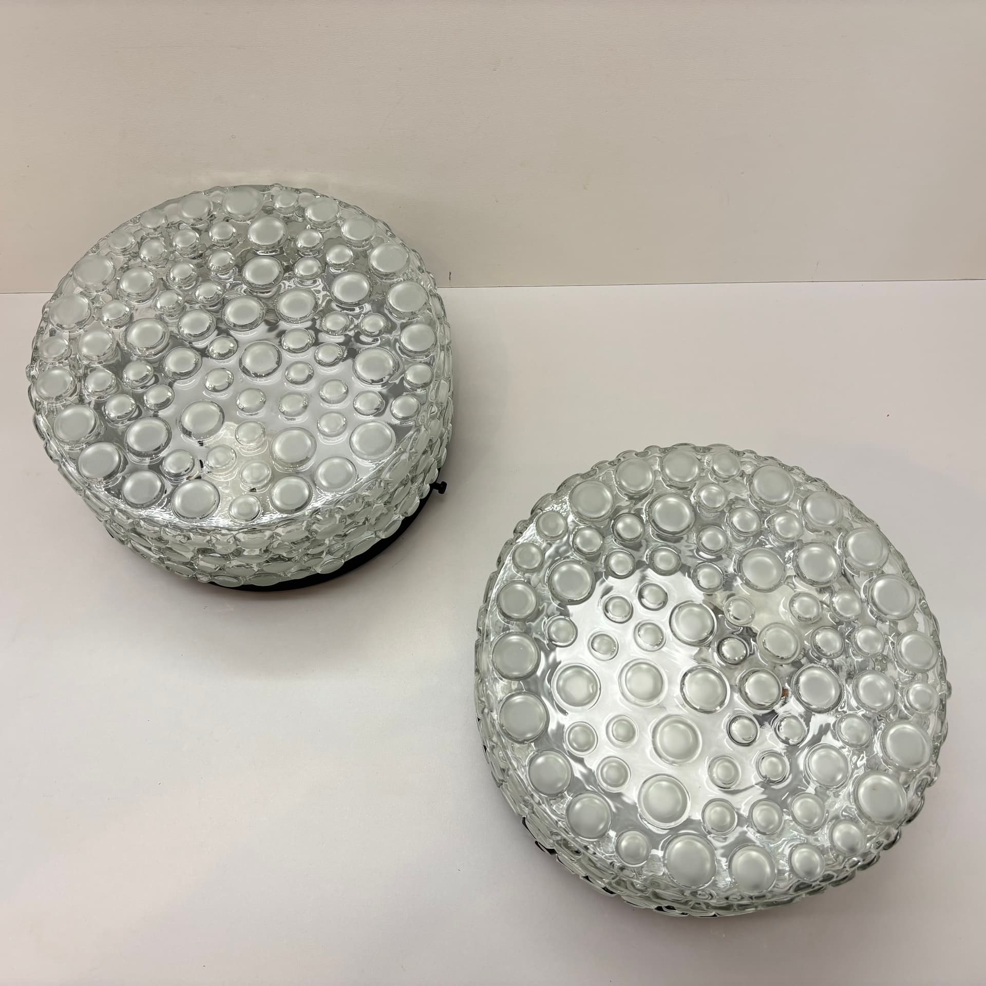 Pair of Bubble wall lamps, transparent glass, black metal, Germany, 1980s. - 92359