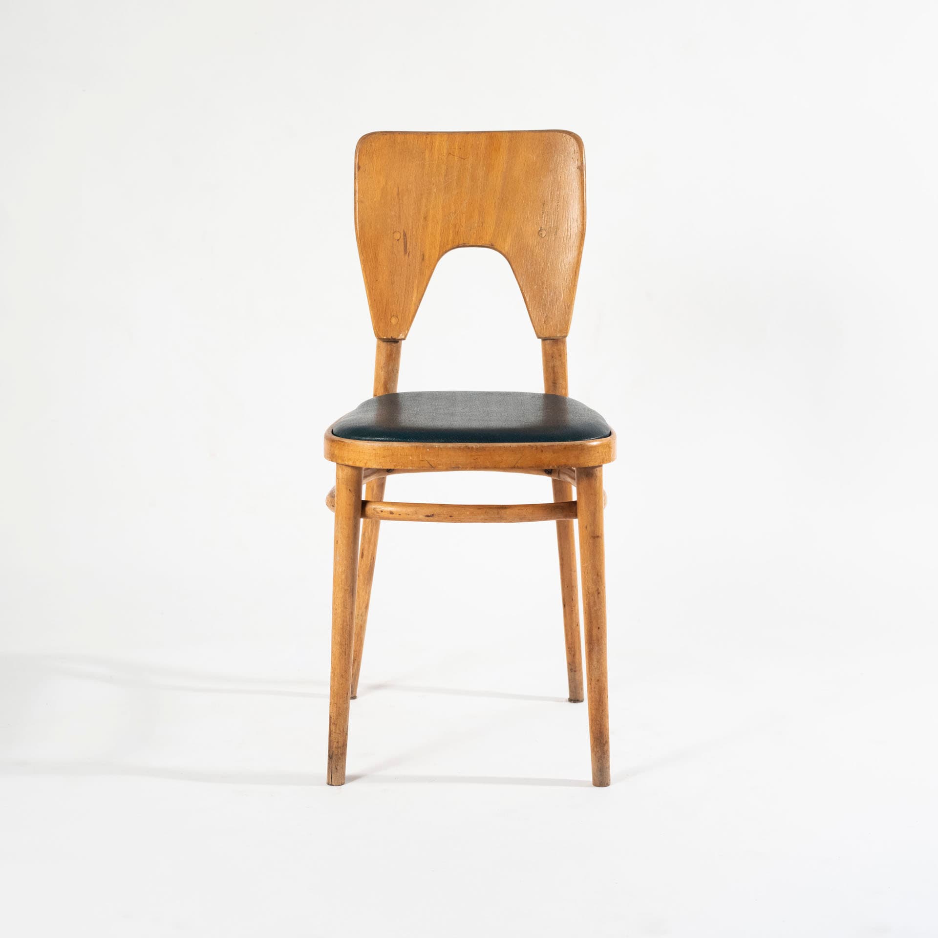 Krzesło A 590, sztuczna skóra bottle green, buk, sklejka, proj. M. Sigmund, Polska, lata 50. - 98807