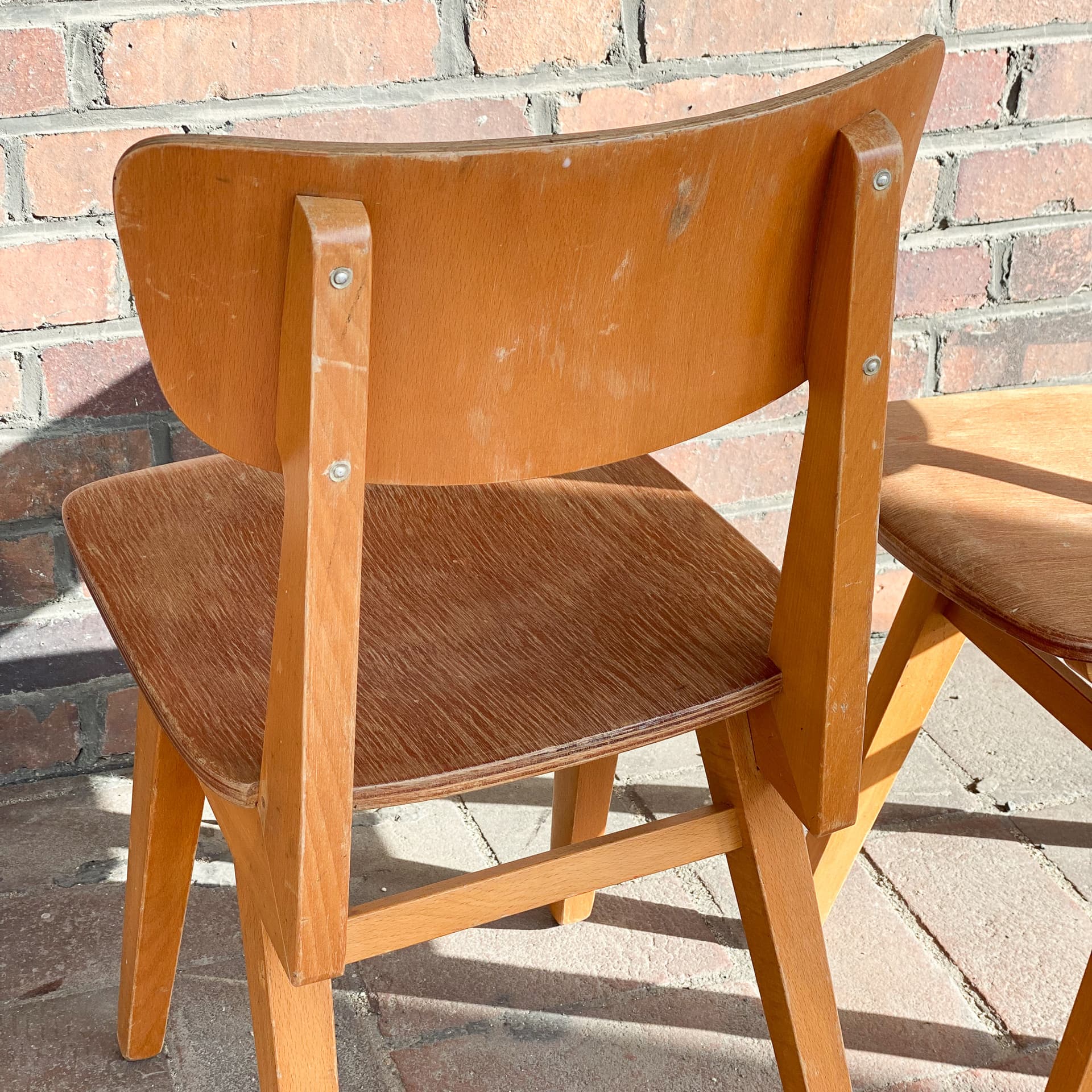 Pair of school chairs, light brown, plywood, Germany, 1960s. - 98986