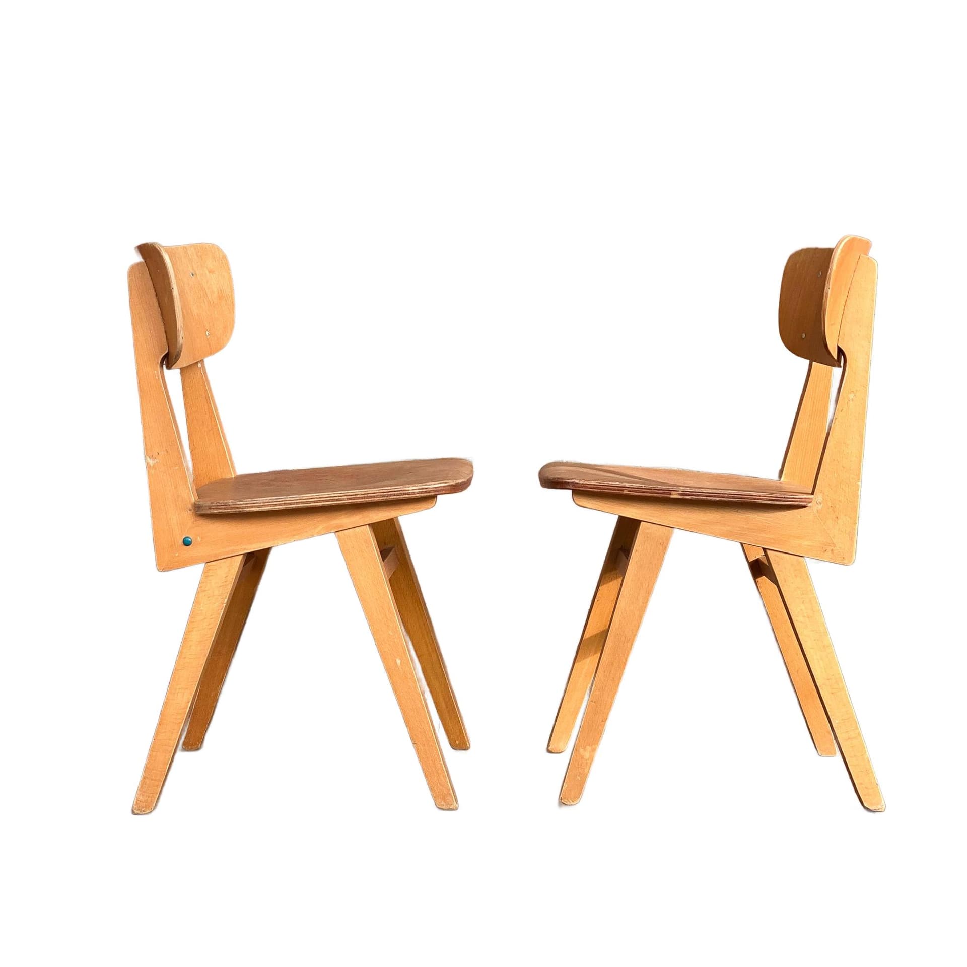 Pair of school chairs, light brown, plywood, Germany, 1960s.