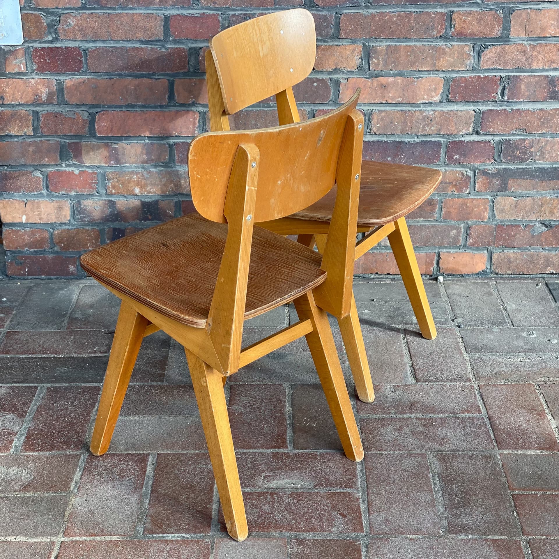 Pair of school chairs, light brown, plywood, Germany, 1960s. - 98983