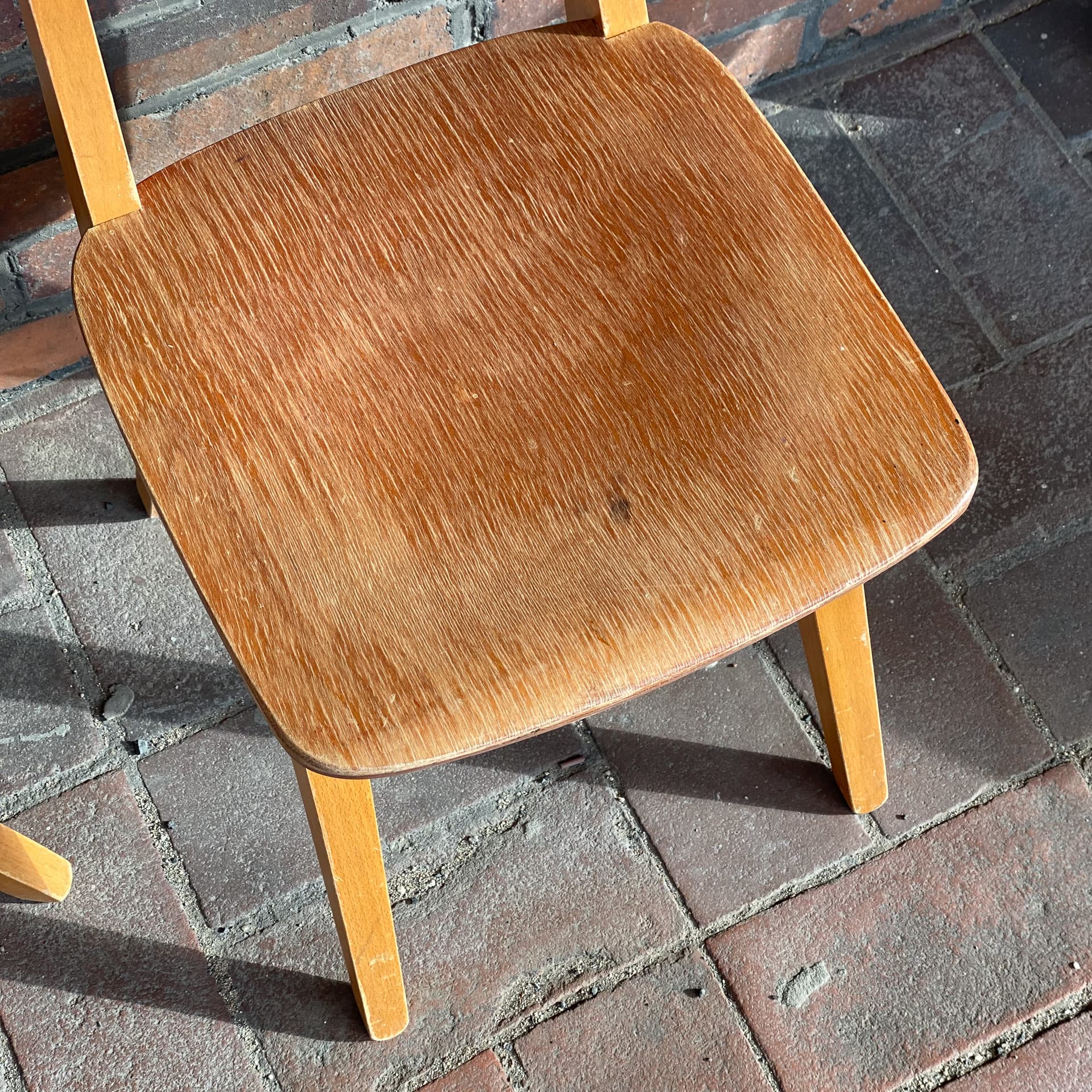 Pair of school chairs, light brown, plywood, Germany, 1960s. - 98981