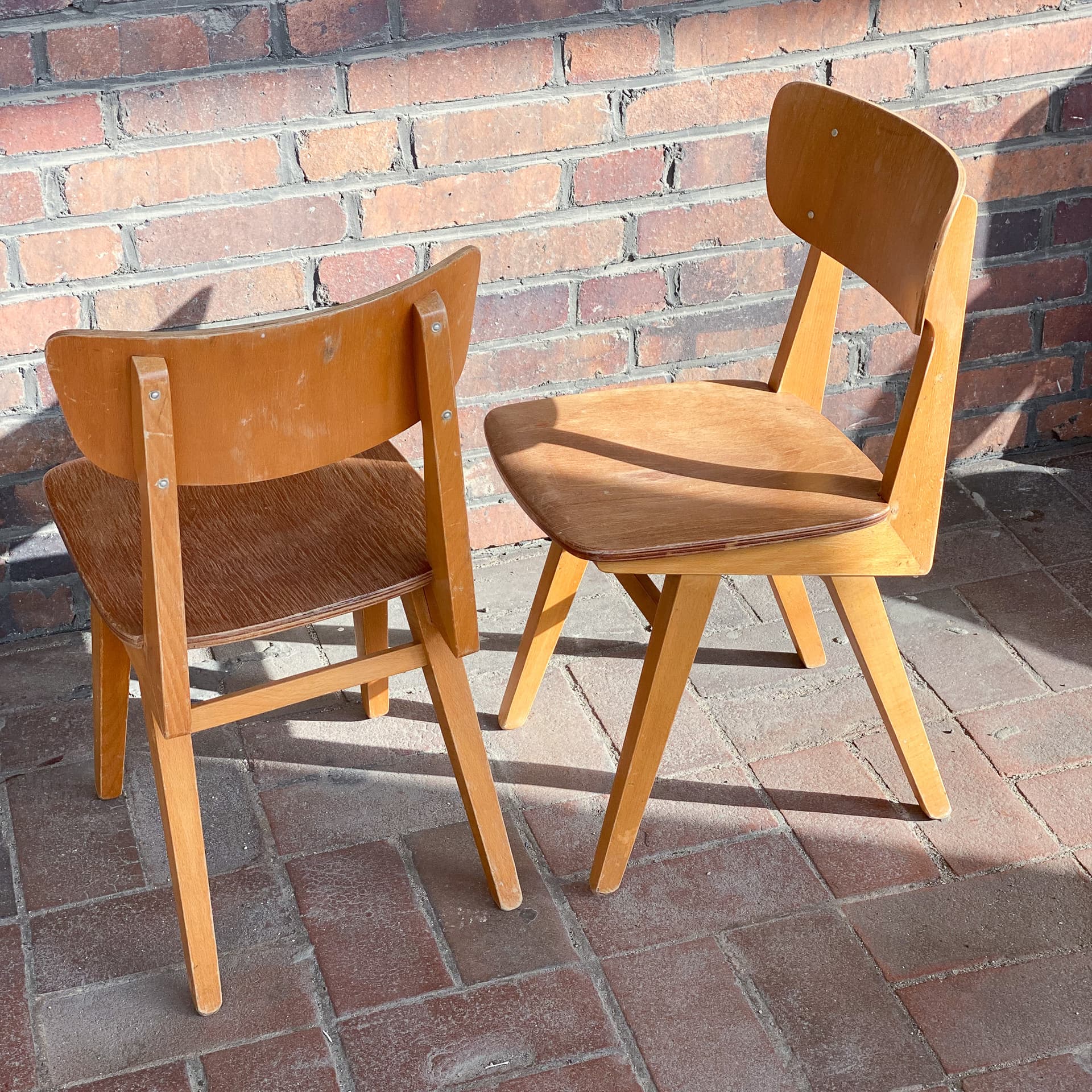Pair of school chairs, light brown, plywood, Germany, 1960s. - 98985
