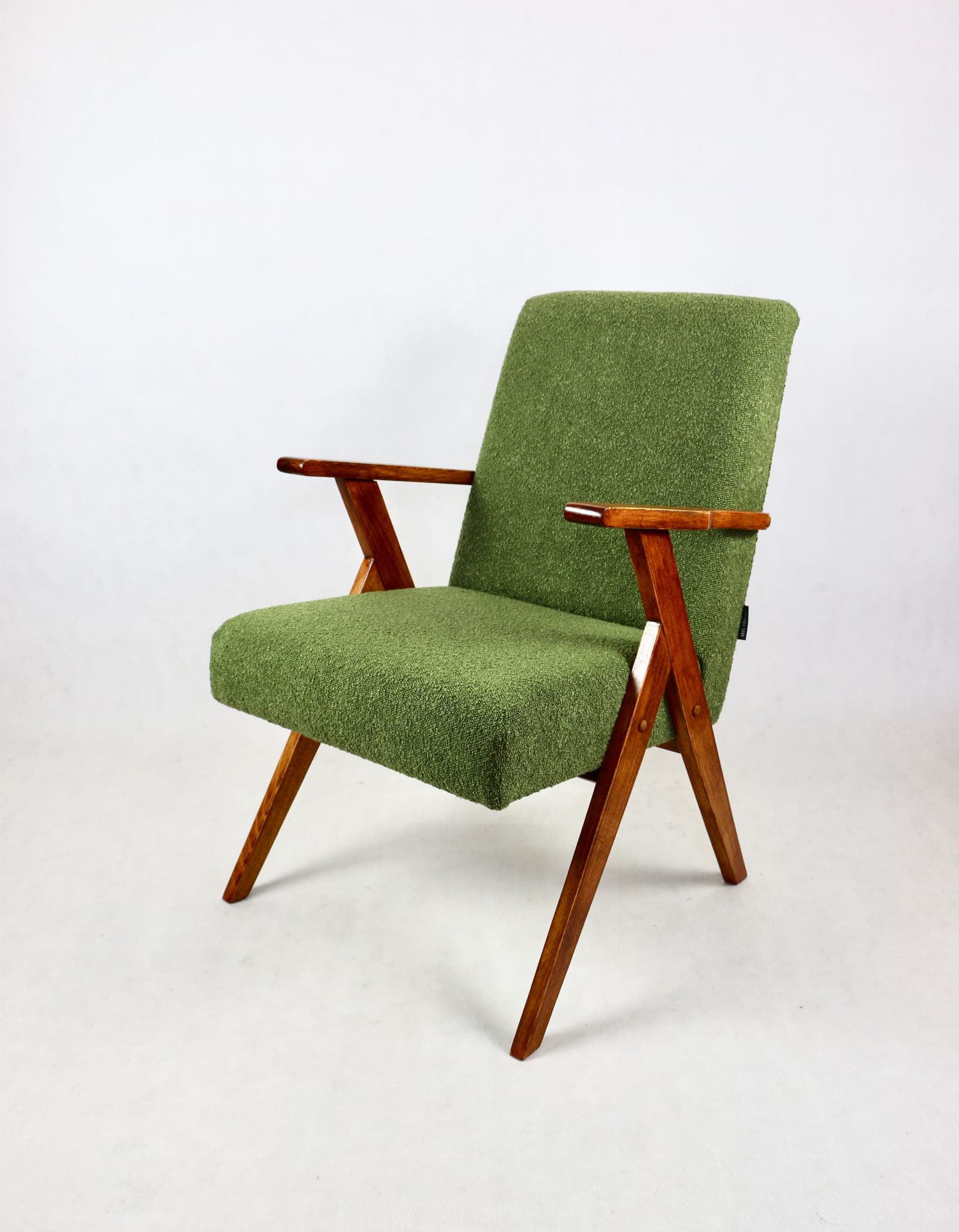 Armchair, green bouclé, walnut, Poland, 1970s. - 108038