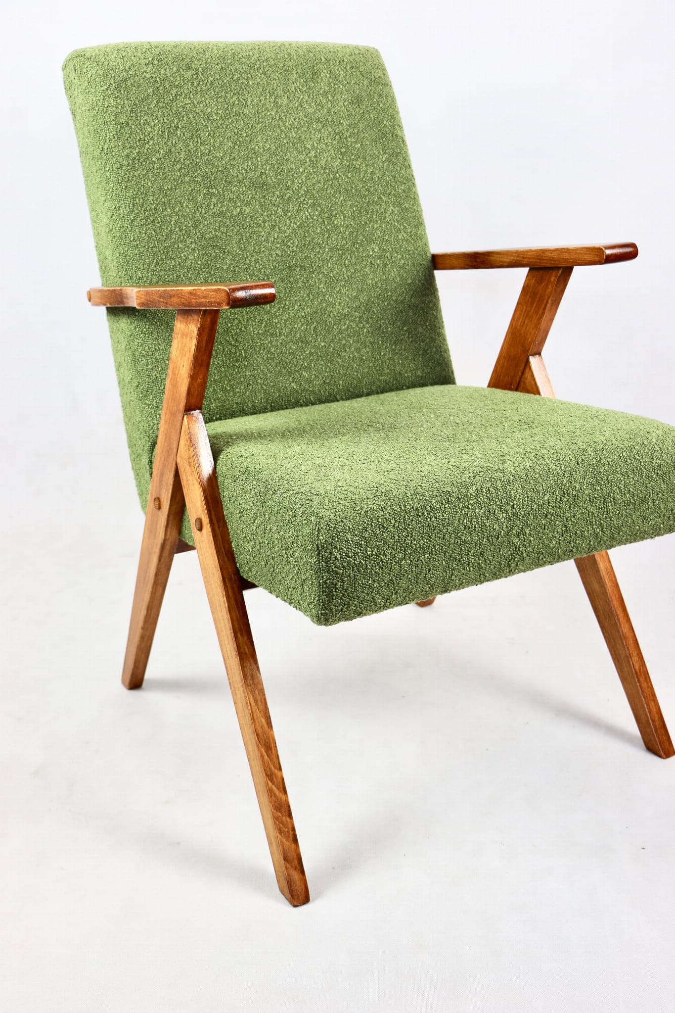 Armchair, green bouclé, walnut, Poland, 1970s. - 108044