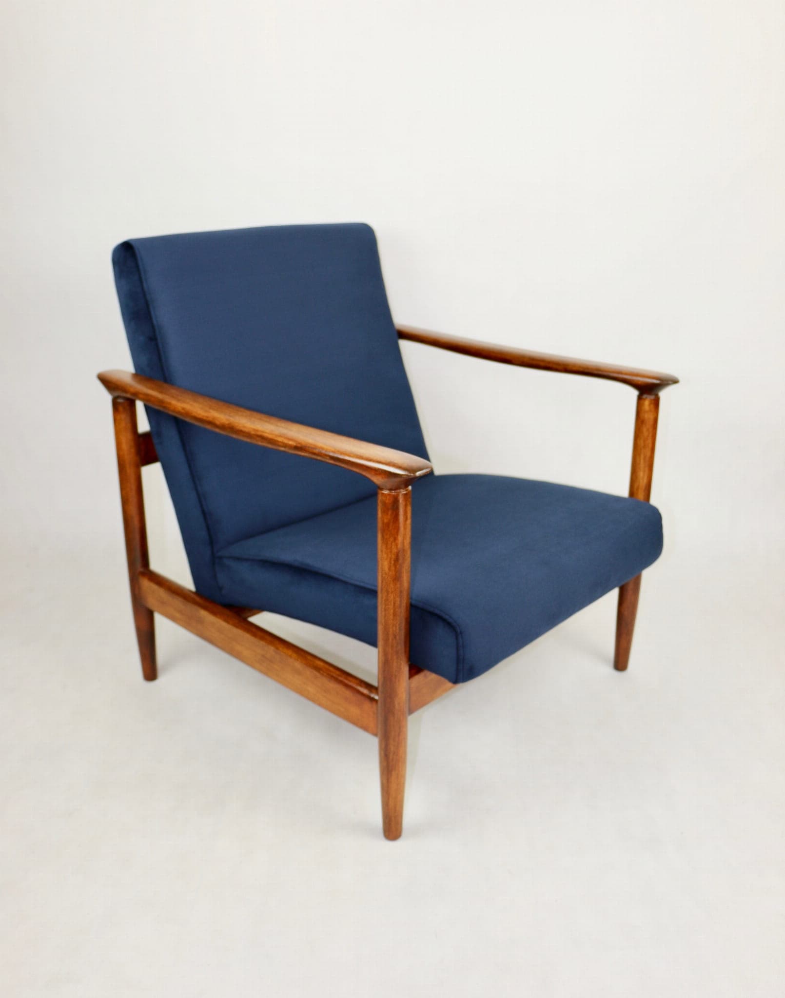 Armchair GFM-142, navy blue velvet, brown wood, by E. Homa, Poland, 1970s. - 107889