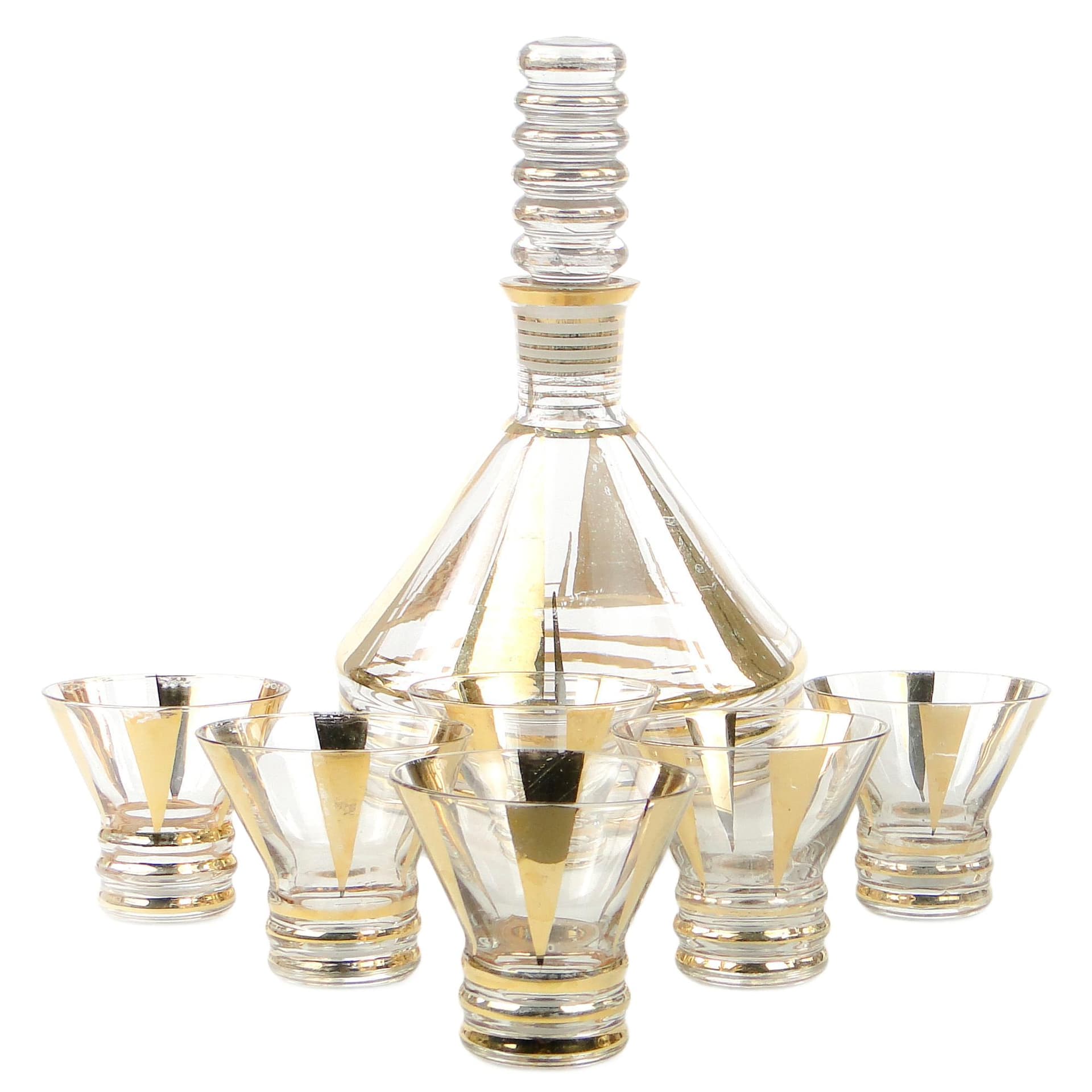 Mid-century modern liqueur set, transparent and gilt glass, Kamenický Šenov, Czechoslovakia, 1950s.