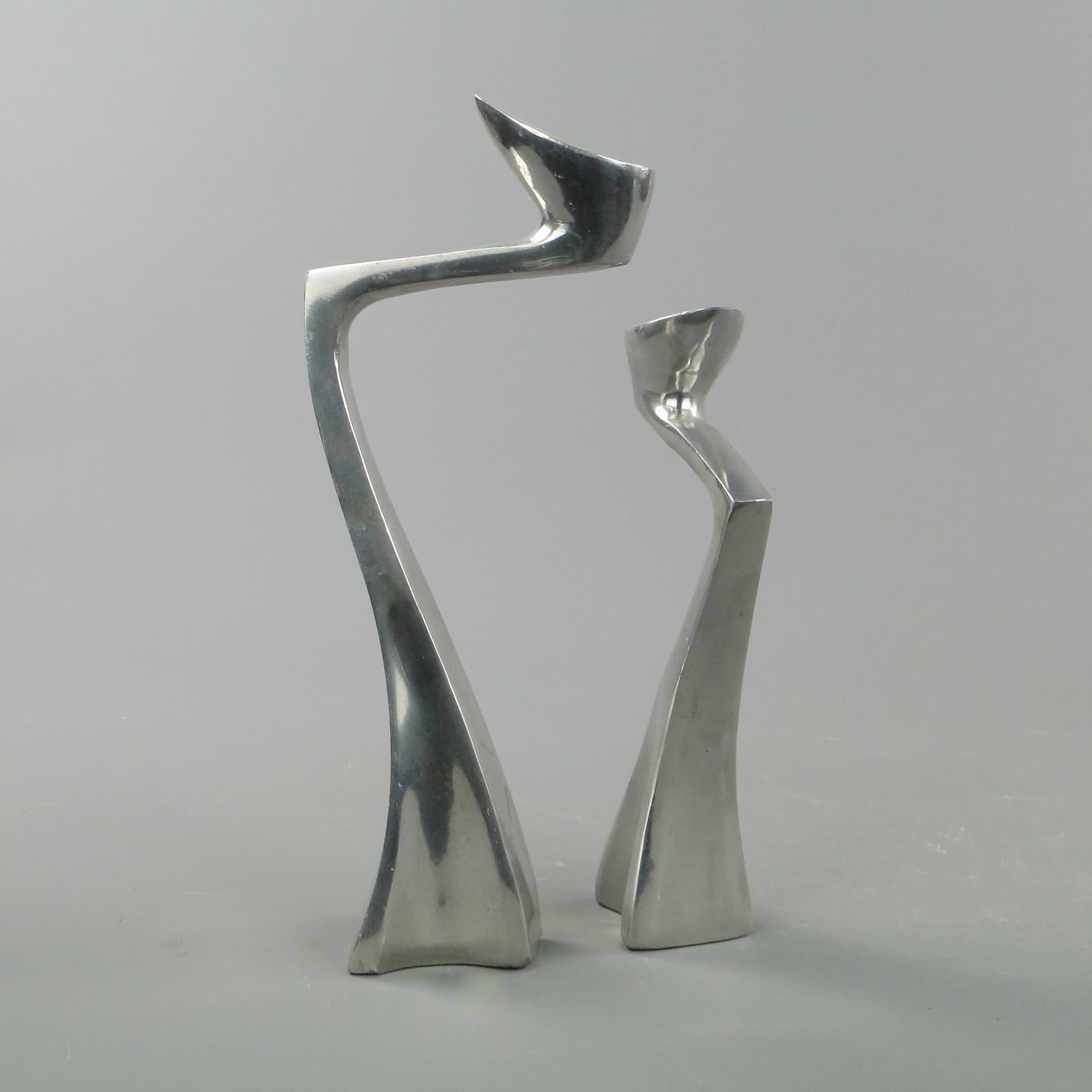 Pair of candle holders Arclumis, silver aluminum, by M. Hilton, United Kingdom, 1980s. - 7999