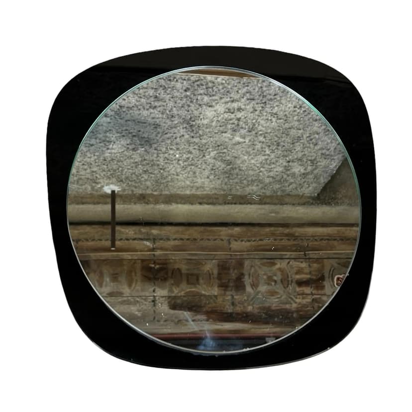 Wall mirror asymmetrical, black glass, Poland, 1970s.