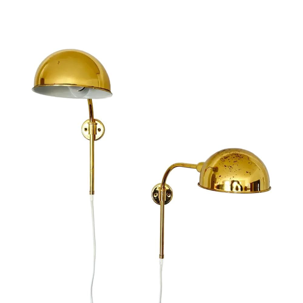 Pair of modernist wall sconces, golden brass, Germany, 1980s.