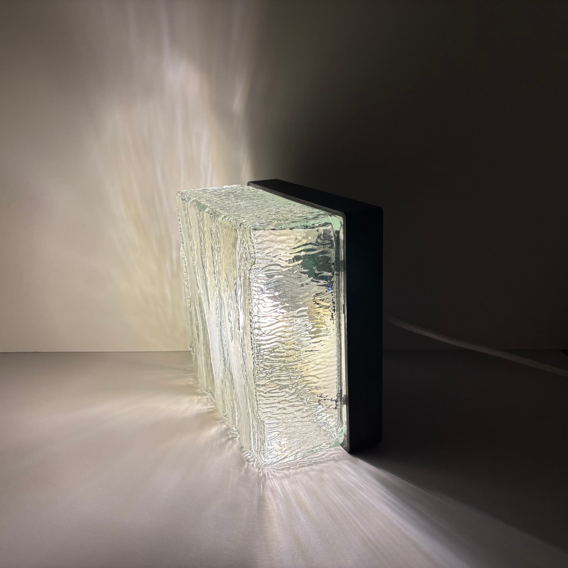 Wall lamp, transparent glass, black bakelite, ERCO, Germany, 1970s. - 131834