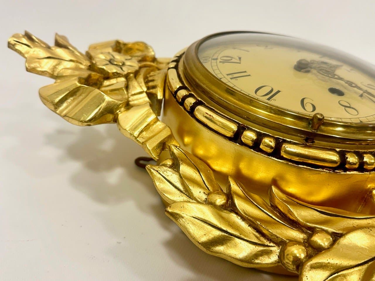 Wall clock, Rococo style, golden, wood, Sweden, 1960s. - 153584