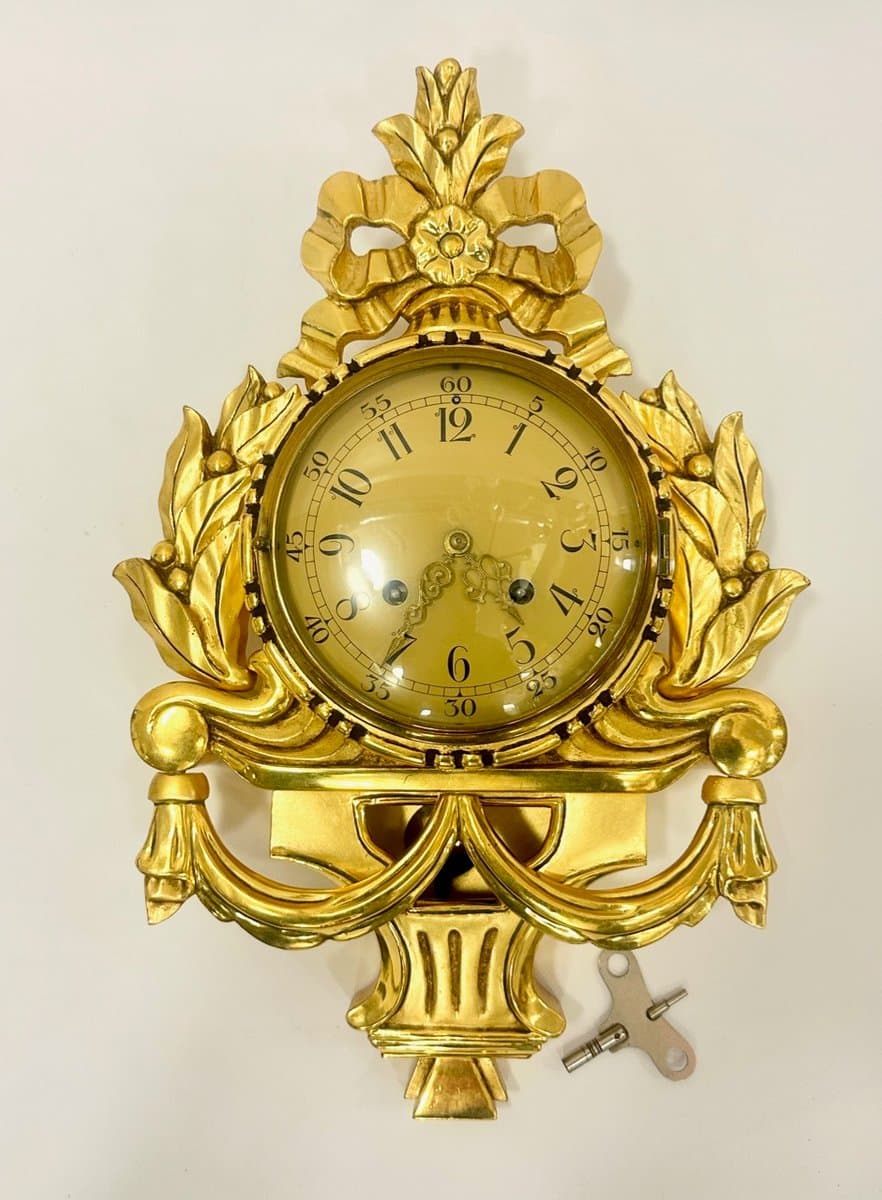 Wall clock, Rococo style, golden, wood, Sweden, 1960s. - 153581