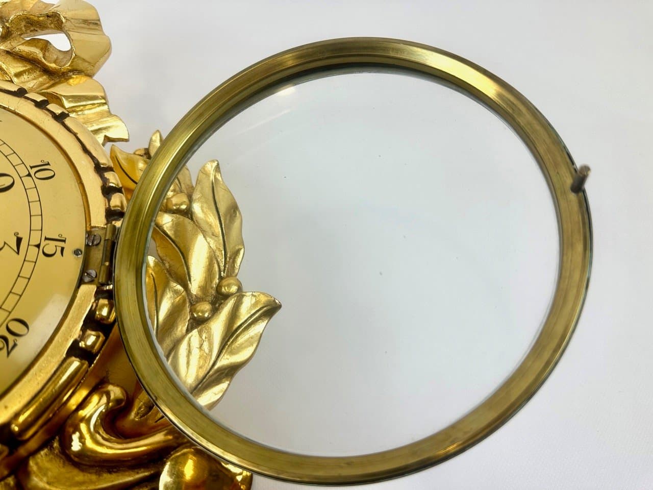 Wall clock, Rococo style, golden, wood, Sweden, 1960s. - 153588