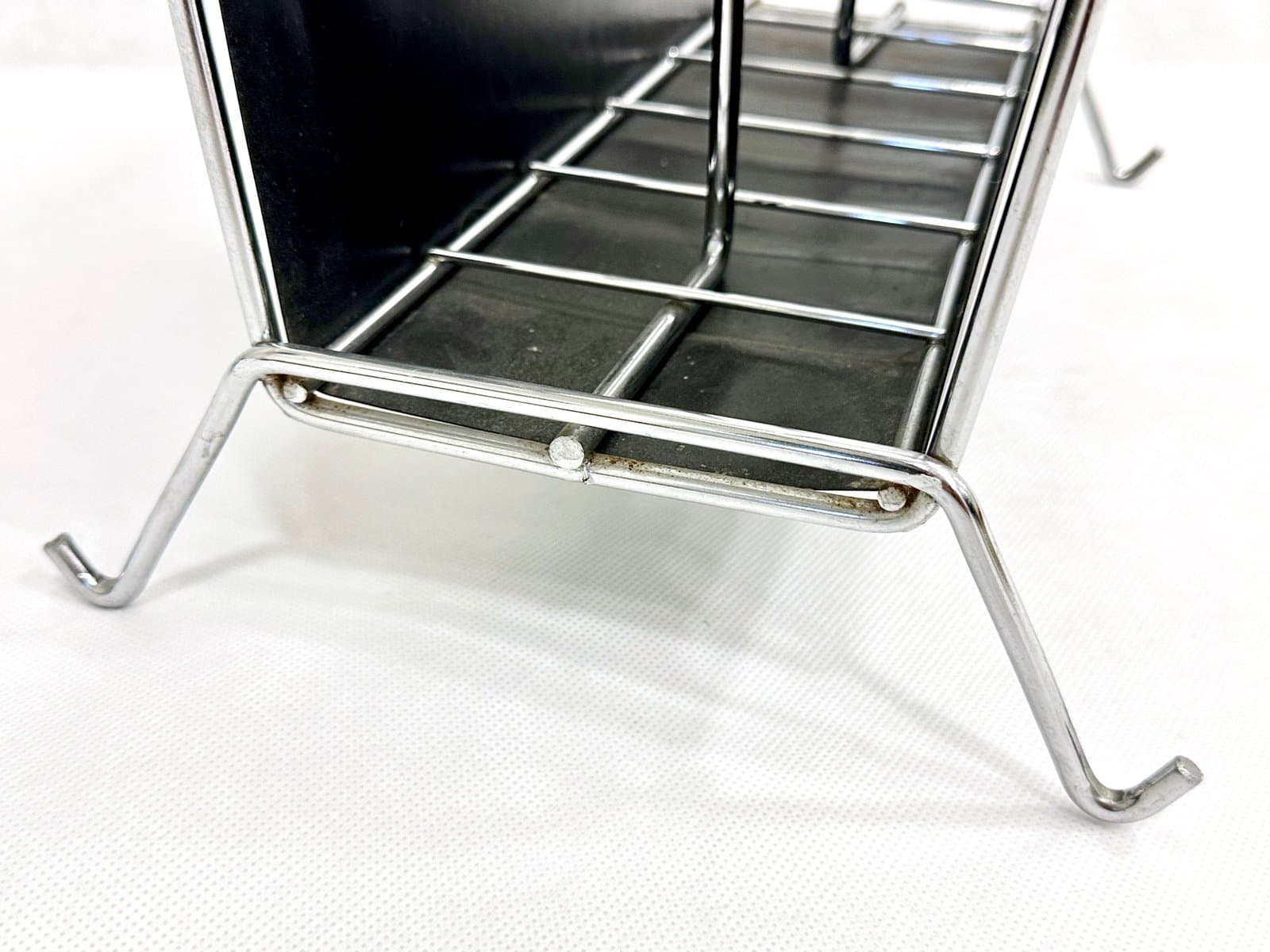 Magazine rack, black vinyl, chrome steel, Germany, 1970s. - 155386