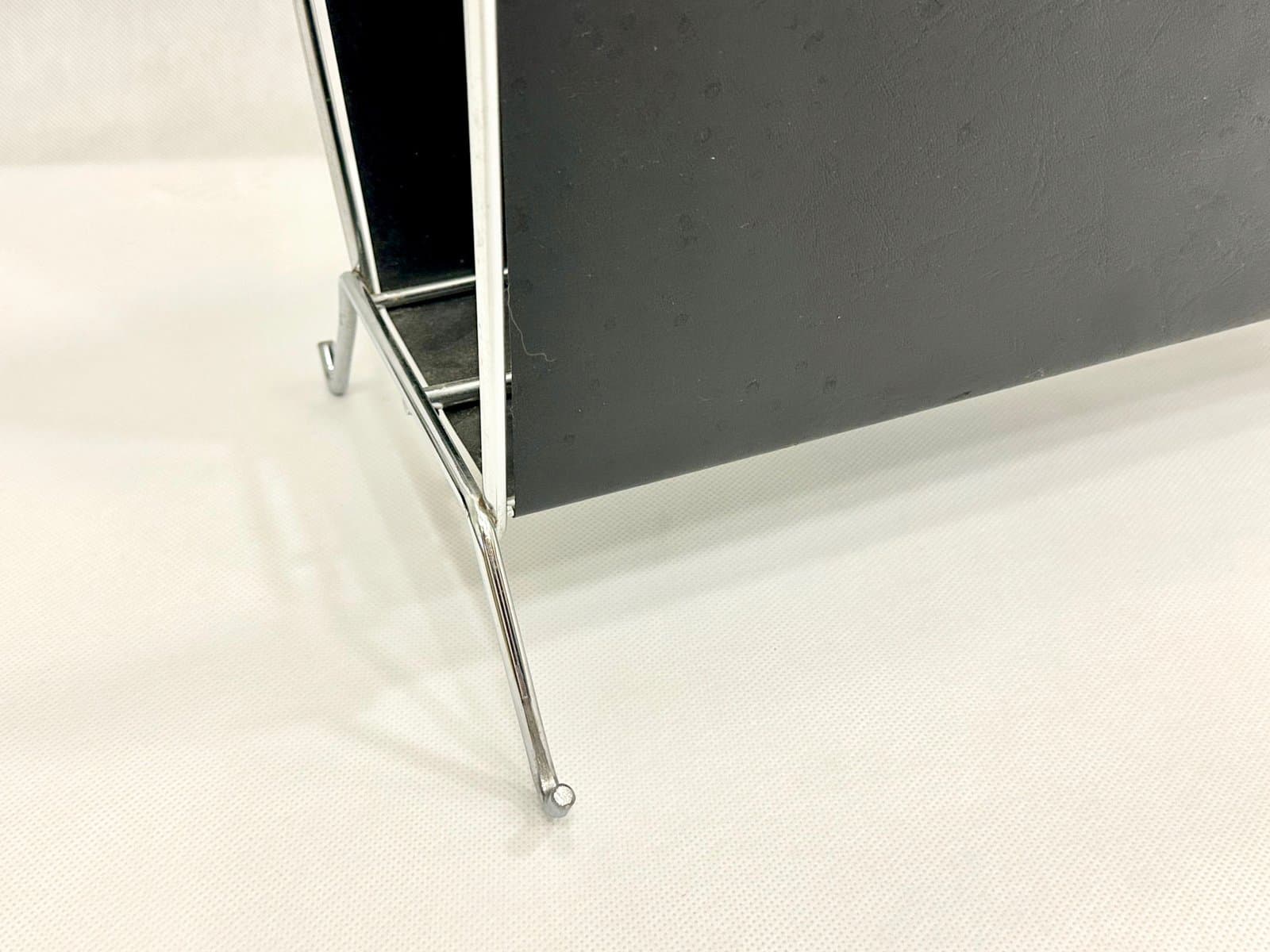 Magazine rack, black vinyl, chrome steel, Germany, 1970s. - 155387
