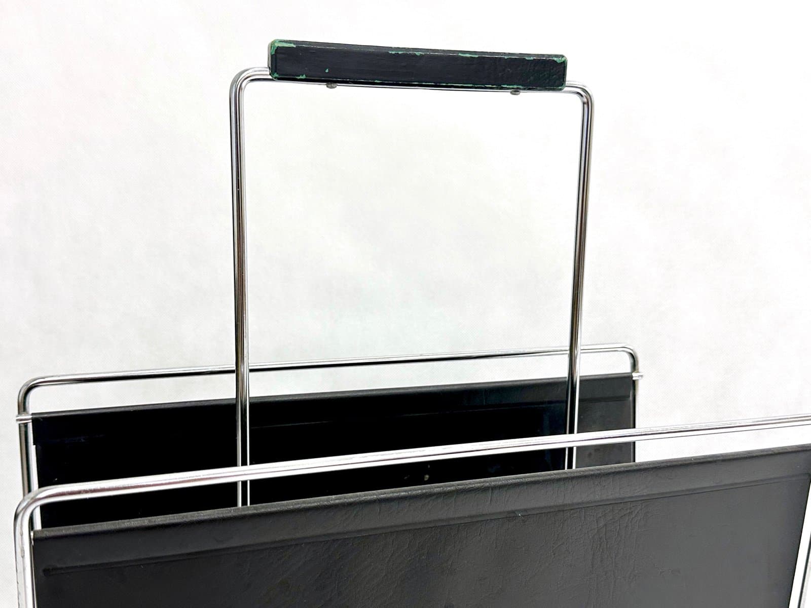 Magazine rack, black vinyl, chrome steel, Germany, 1970s. - 155388