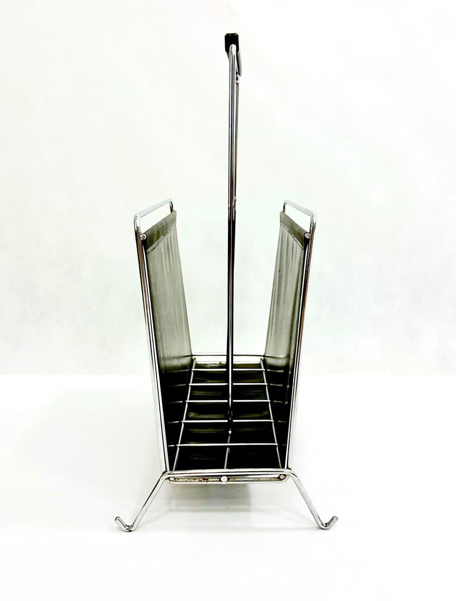 Magazine rack, black vinyl, chrome steel, Germany, 1970s. - 155385