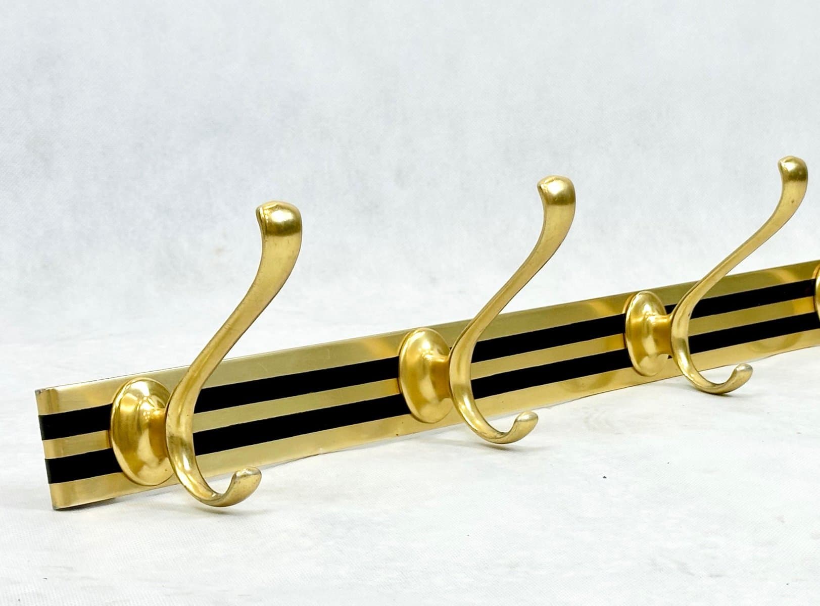 Wall-mounted coat rack, golden brass, Germany, 1960s. - 155584