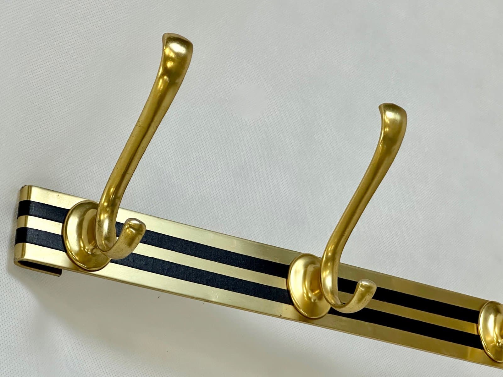 Wall-mounted coat rack, golden brass, Germany, 1960s. - 155586