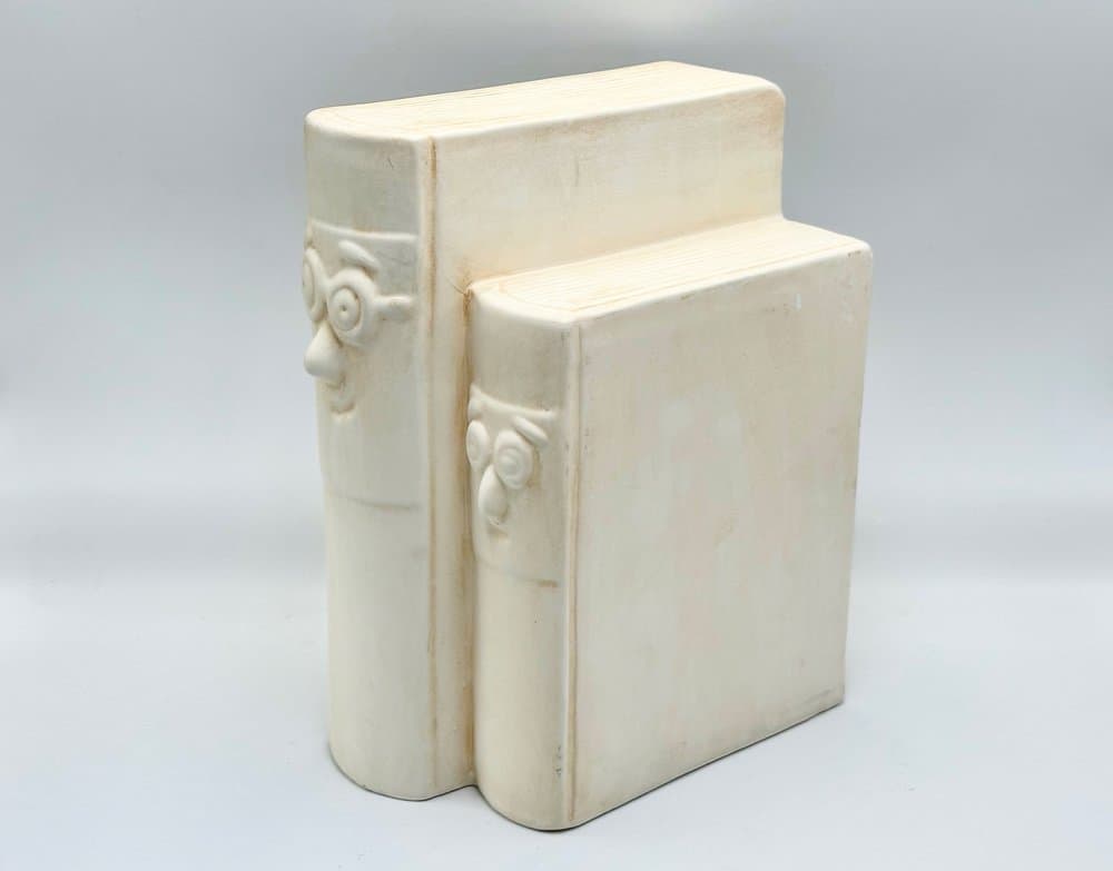 Bookend Happy Book, beige ceramic, Germany, 1970s. - 156108