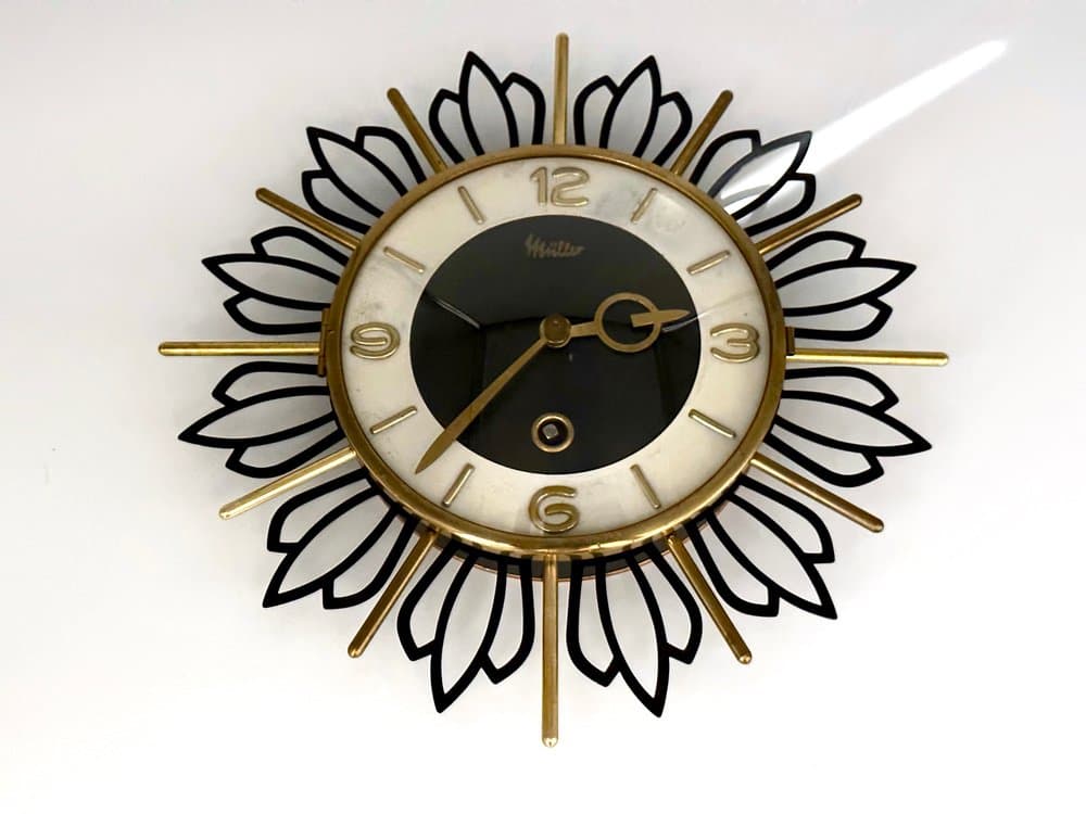 Wall Clock Sunburst, black gold, brass steel glass, Germany, 1960s. - 156188