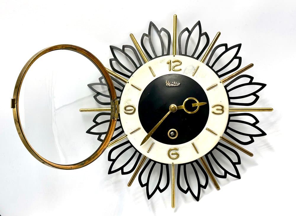 Wall Clock Sunburst, black gold, brass steel glass, Germany, 1960s. - 156191