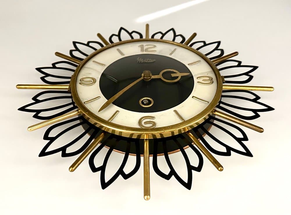 Wall Clock Sunburst, black gold, brass steel glass, Germany, 1960s. - 156192