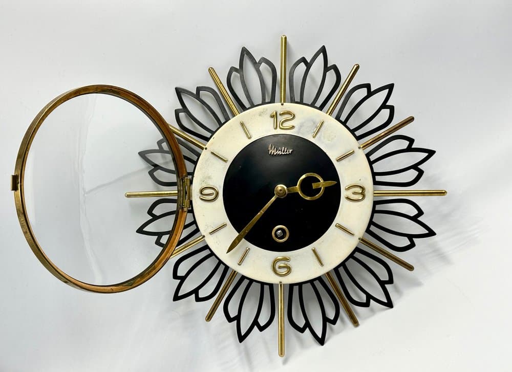 Wall Clock Sunburst, black gold, brass steel glass, Germany, 1960s. - 156189