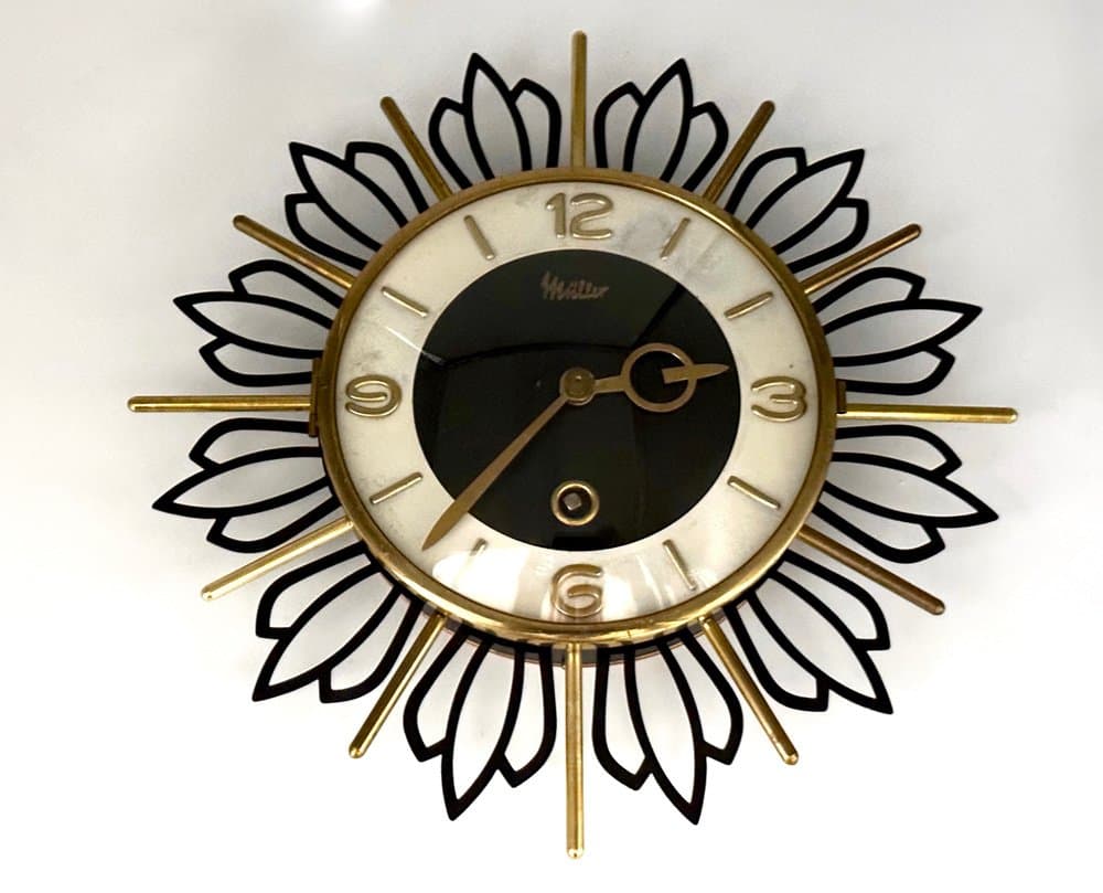 Wall Clock Sunburst, black gold, brass steel glass, Germany, 1960s. - 156190