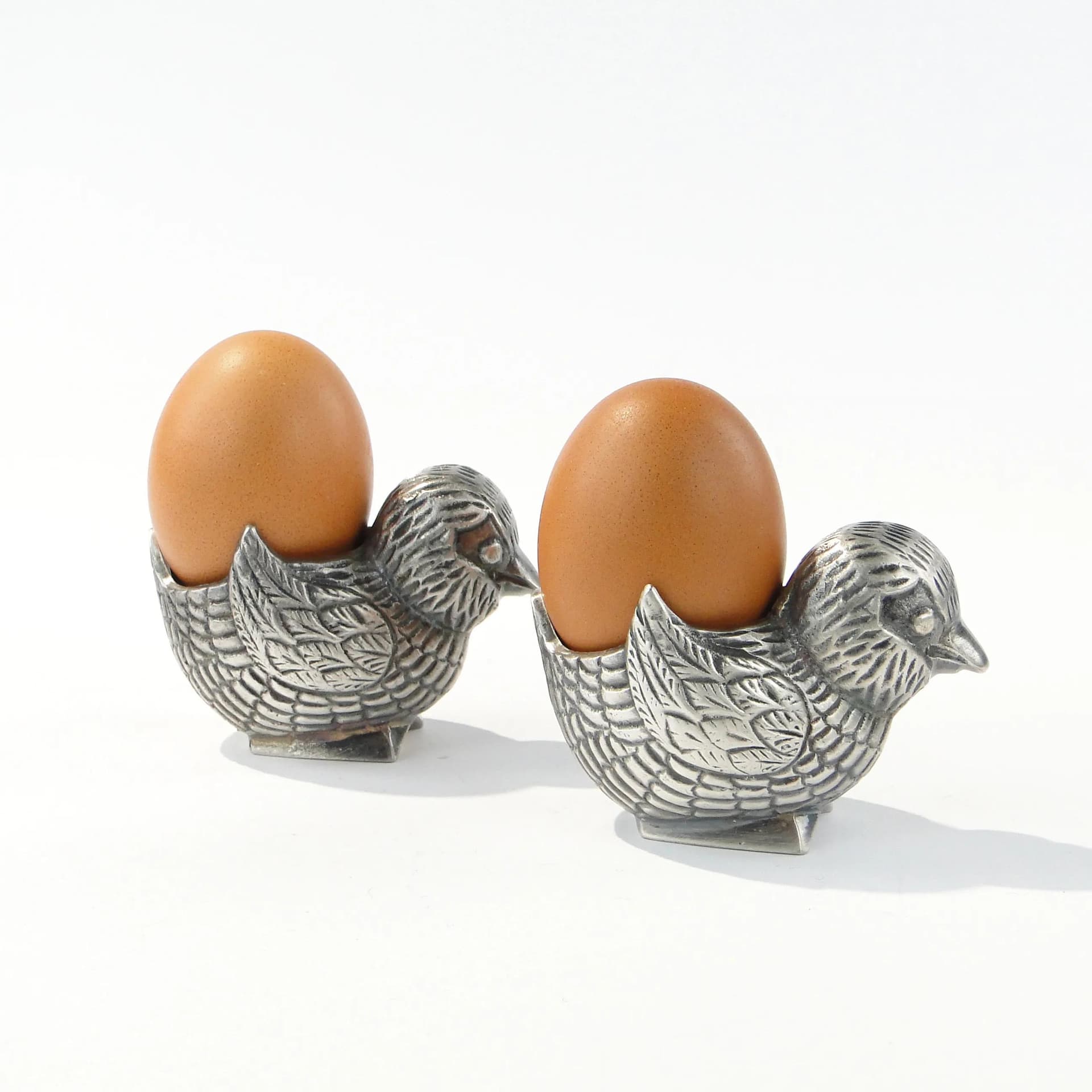 Pair of egg holders, silver plate, Christofle, France, 1940s. - 163907