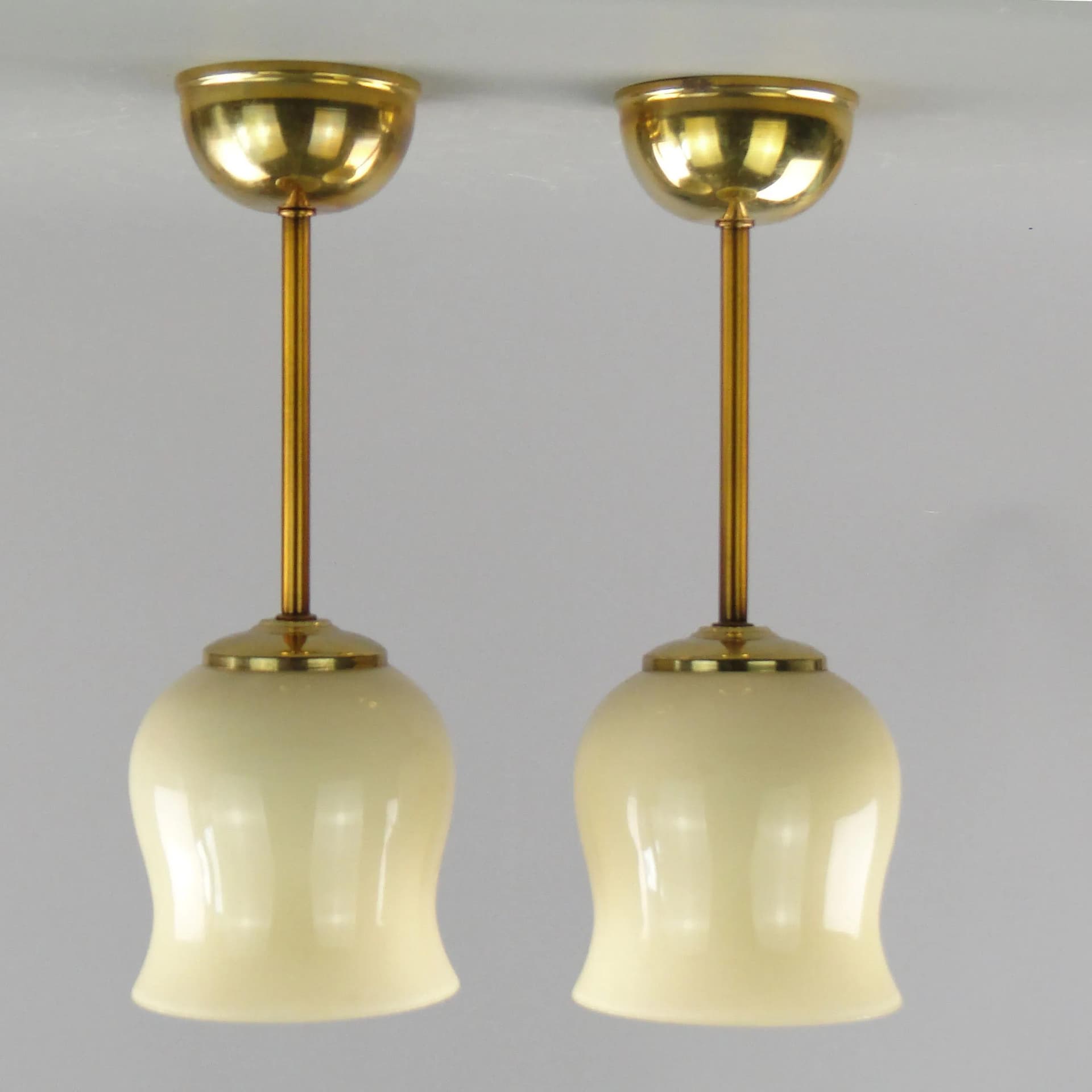 Pair of ceiling lamps, ecru glass, brass, Poland, 1950s - 162551