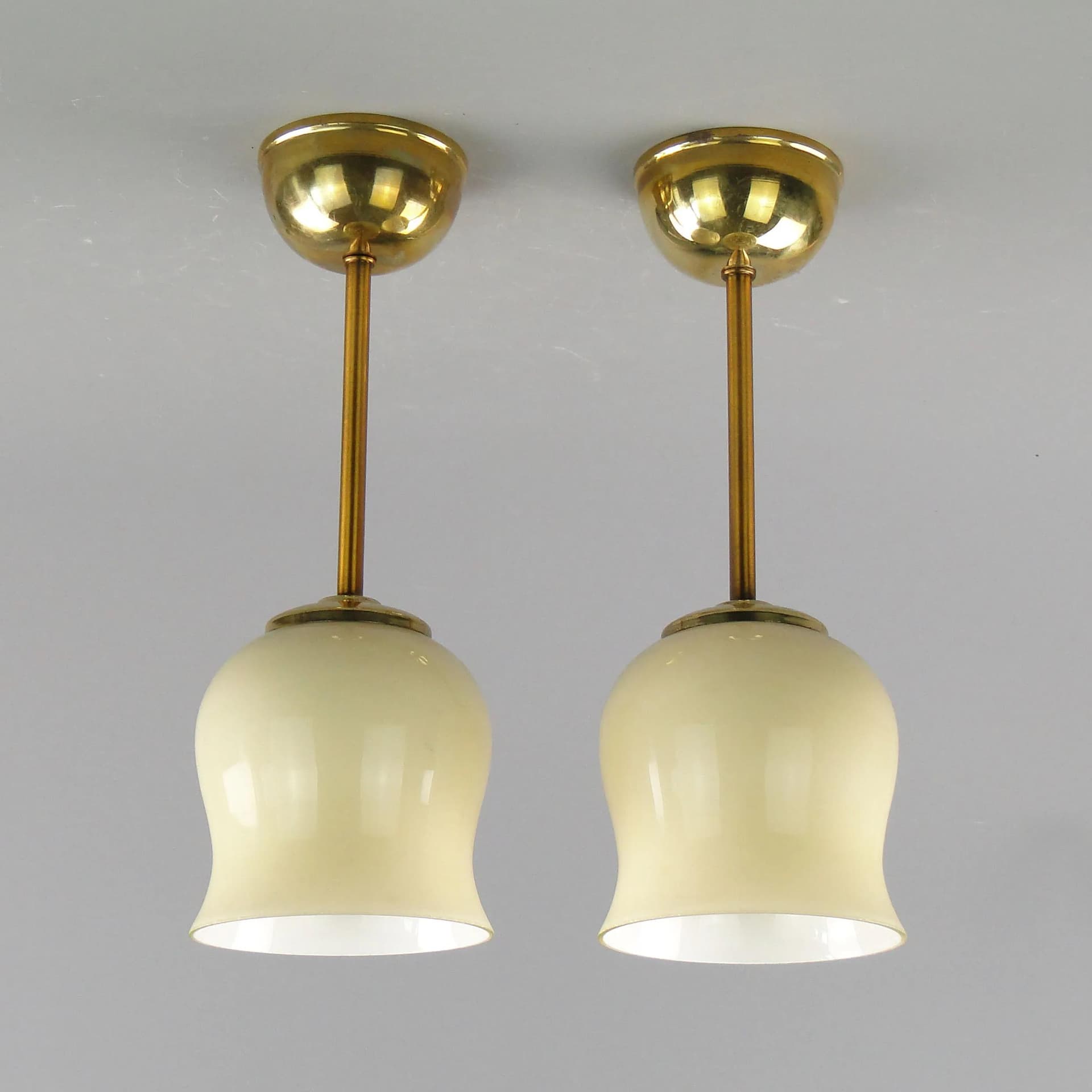 Pair of ceiling lamps, ecru glass, brass, Poland, 1950s - 162549