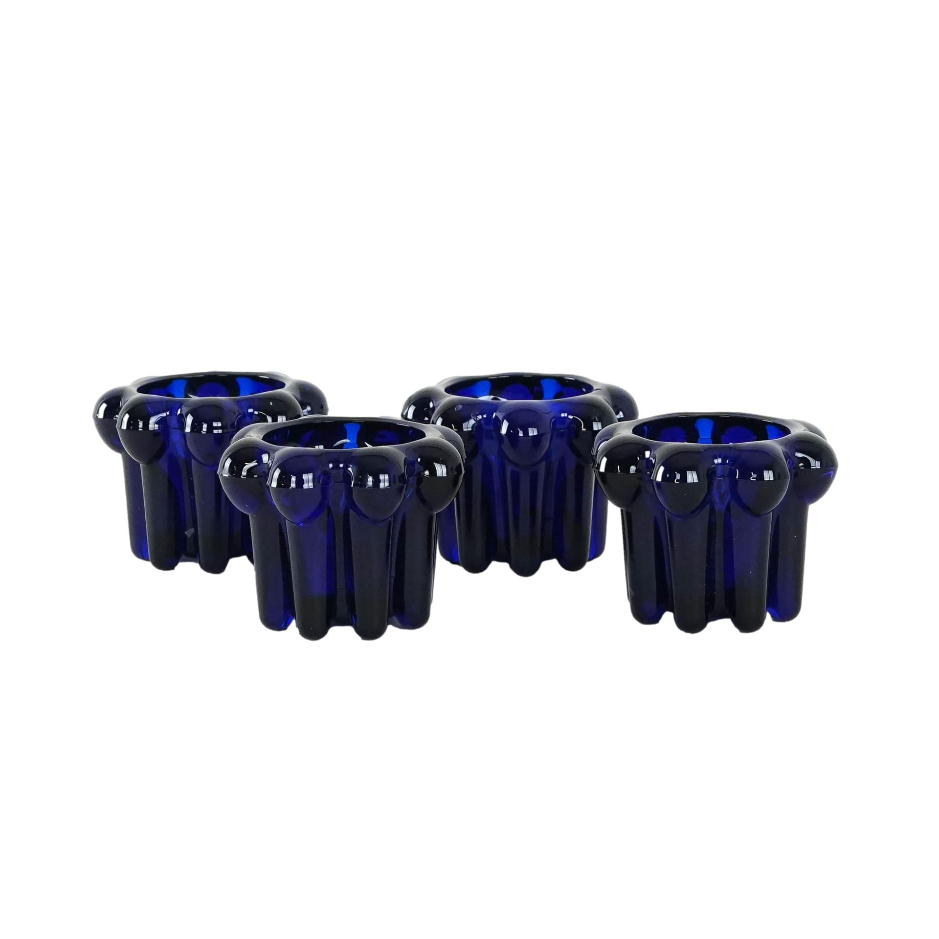 Set of four candle holders, cobalt blue glass, France, 1970s.