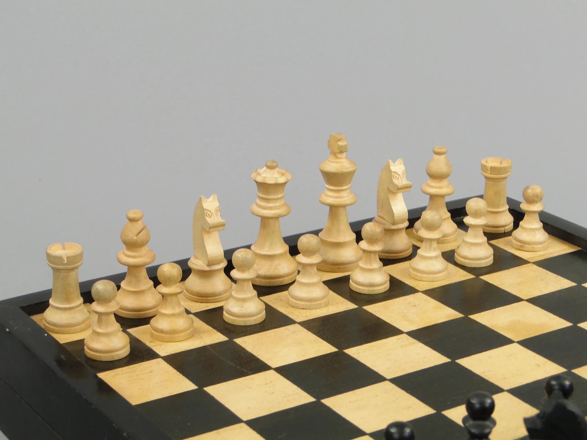 Chess set, black, light wood, black wood, Poland, 1960s. - 11605