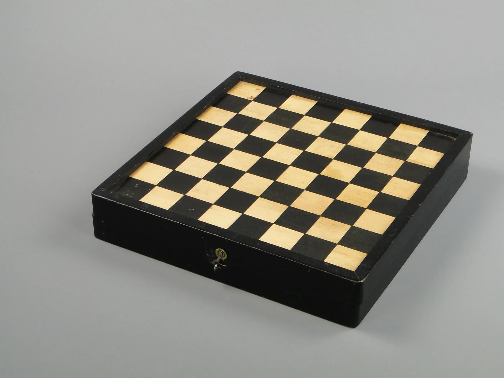 Chess set, black, light wood, black wood, Poland, 1960s. - 11600
