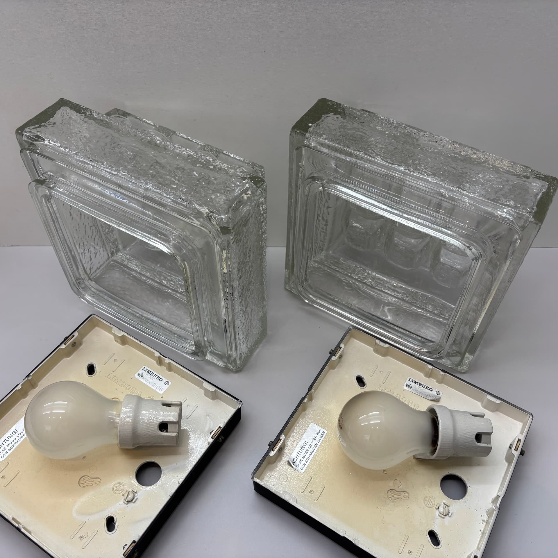 Pair of wall sconces, transparent glass, Germany, 1970s. - 185074