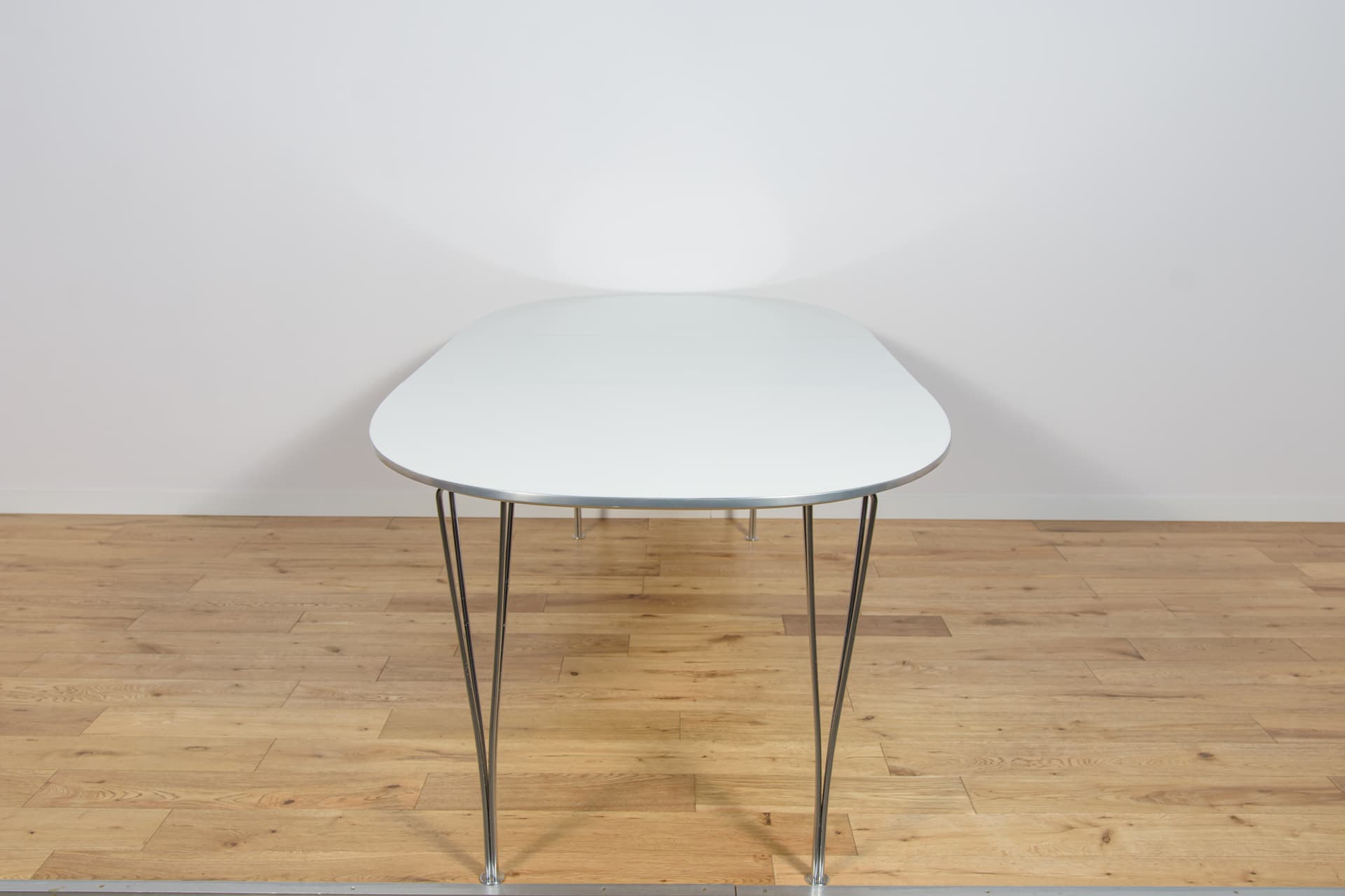 Extendable Table B612 Superellipse, white, aluminum, by P. Hein, B. Mathsson, Fritz Hansen, Denmark, 1960s. - 188092