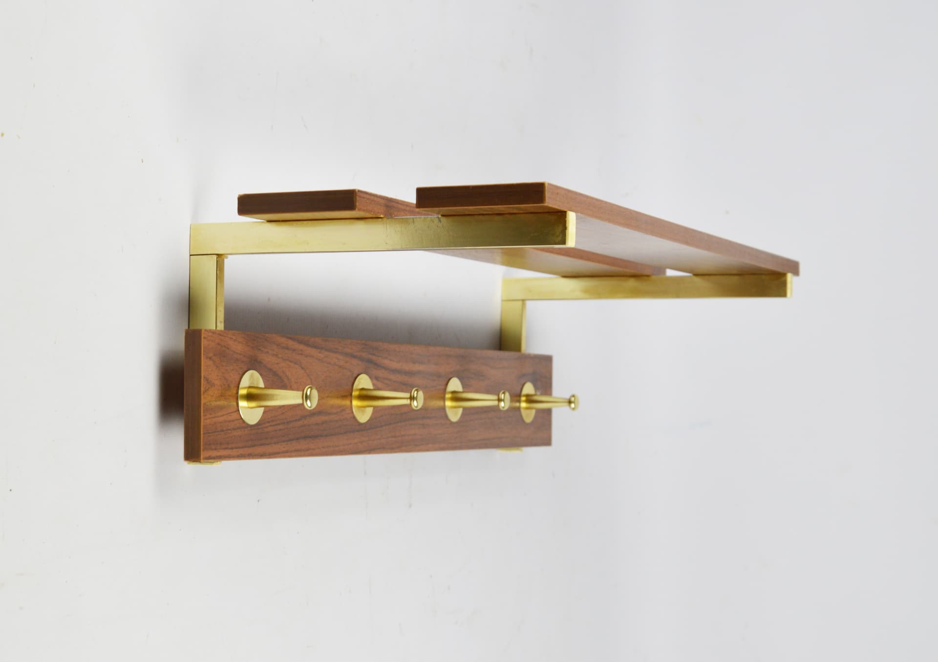 Wall-mounted coat rack, light brown wood, brass, 1970s. - 195986