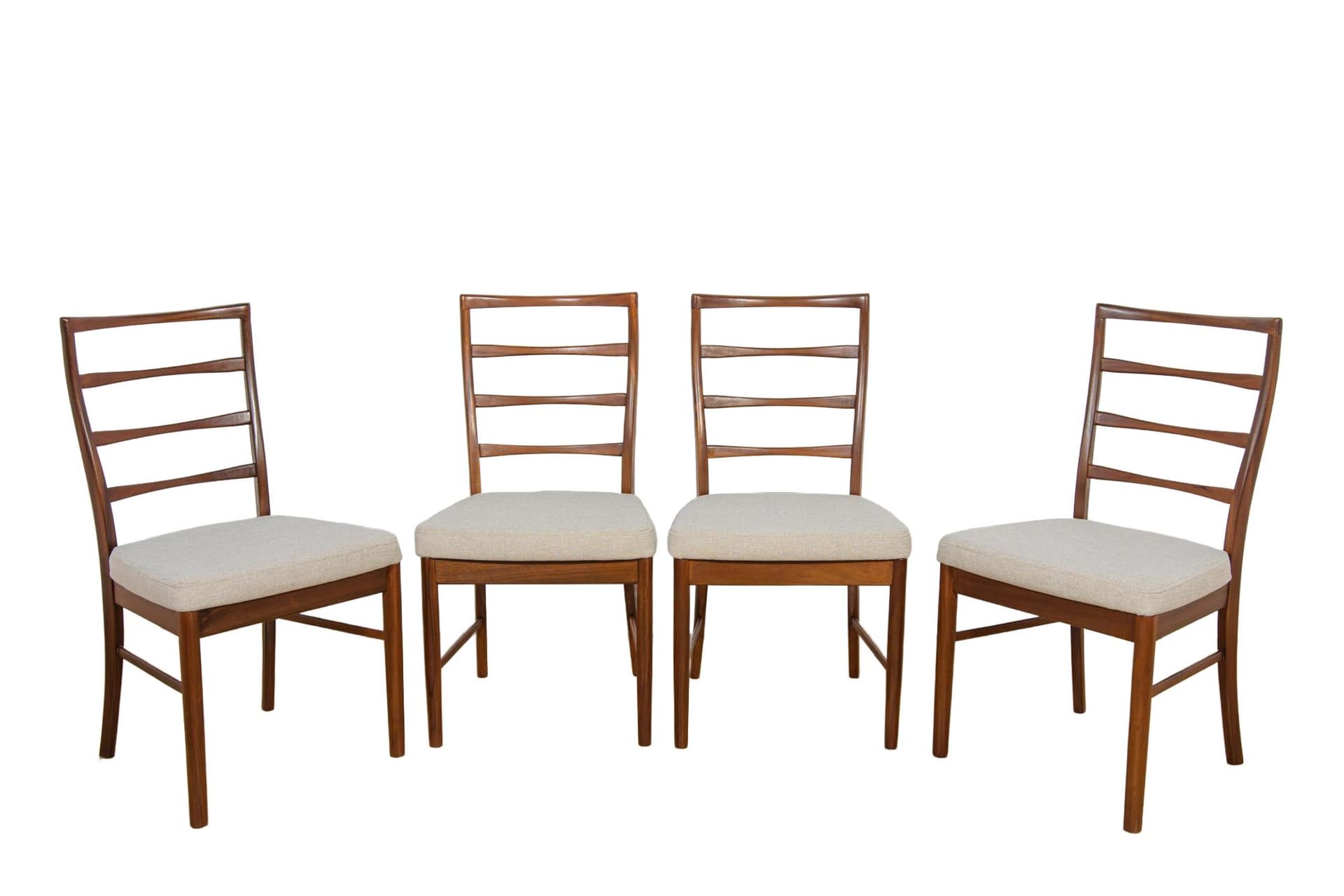 Set of four chairs, light brown teak, McIntosh, United Kingdom, 1960s.